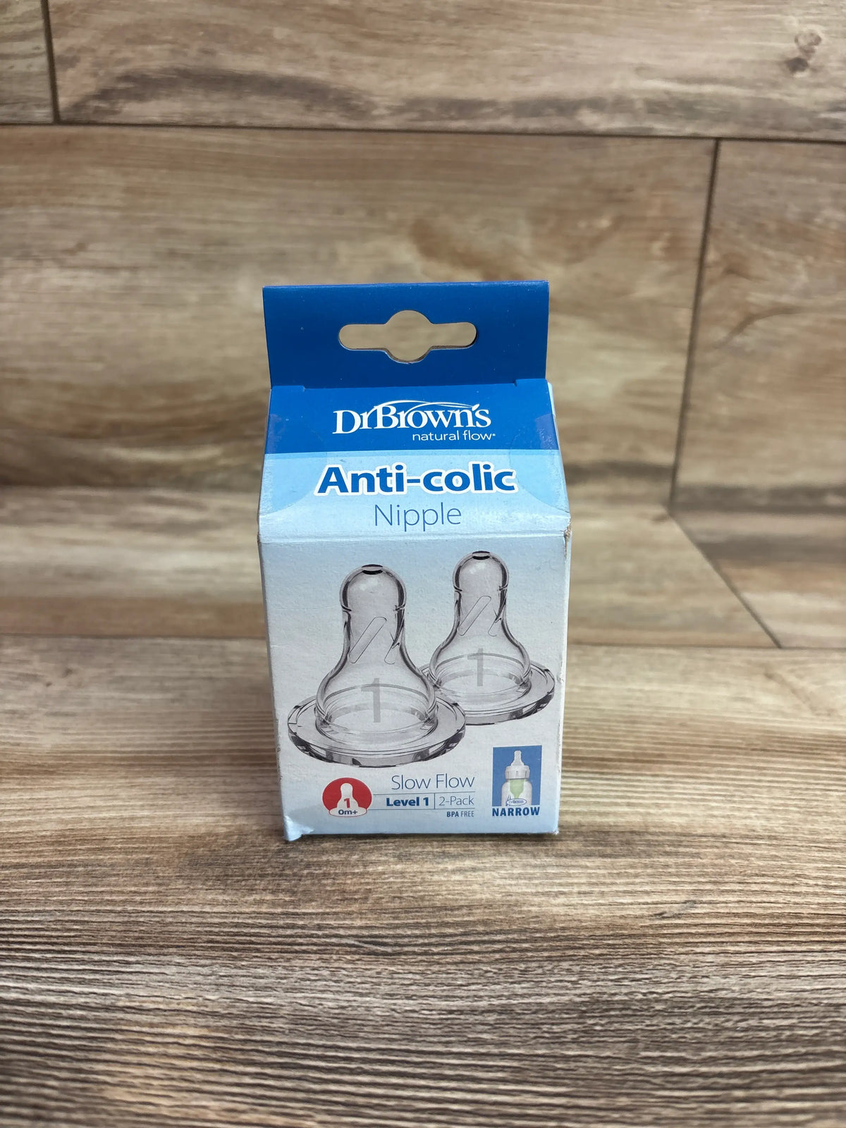 Front view of Dr Brown’s Level 1 narrow baby bottle silicone nipples showcasing slow flow and anti-colic packaging in a 2-pack box