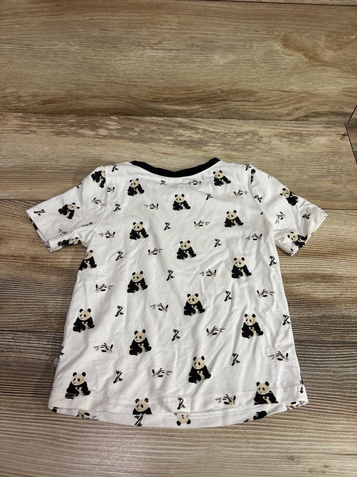 White Kyte Baby bamboo t-shirt with a black panda and bamboo print, size 2T.