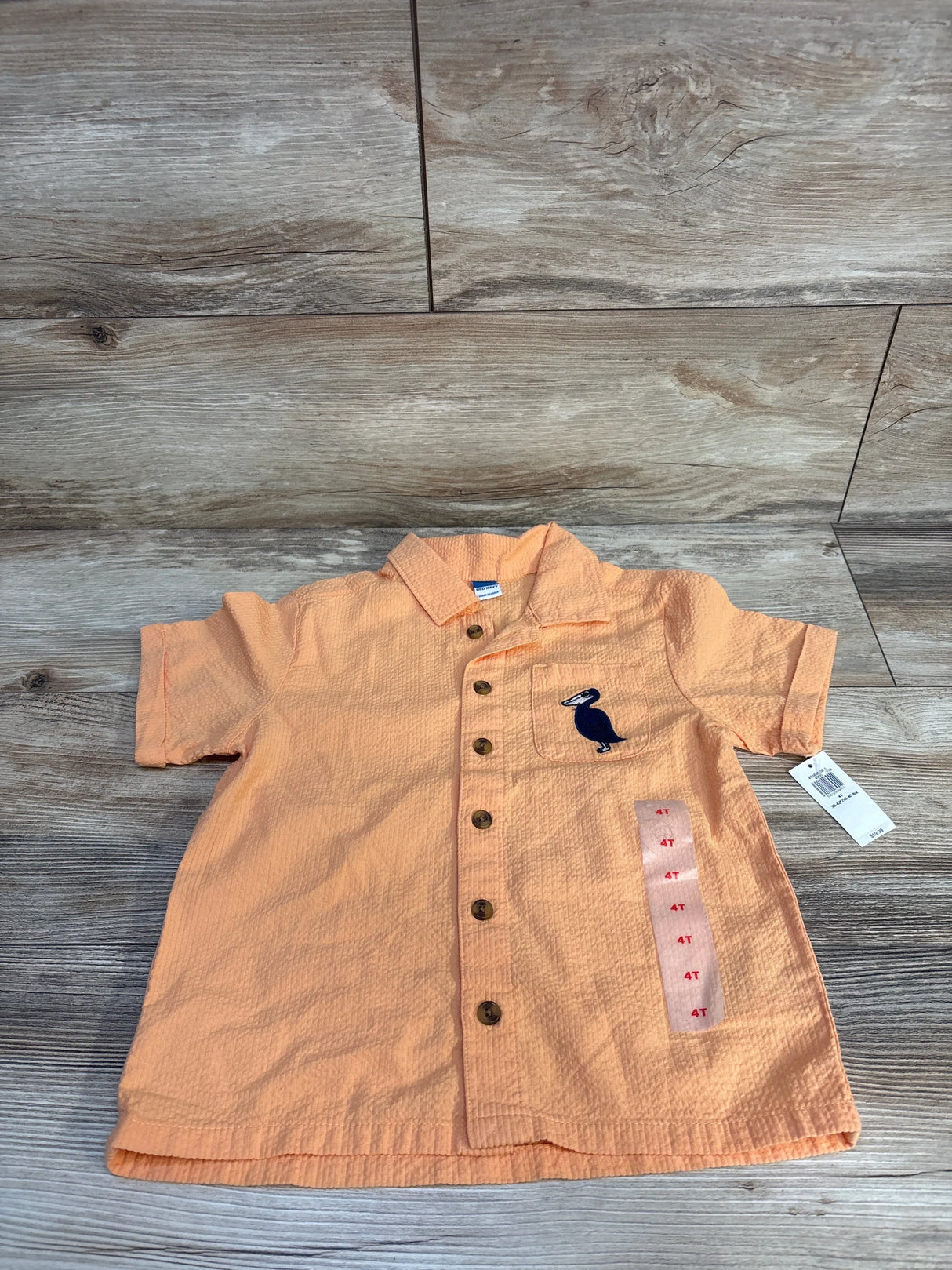 Orange 4T toddler shirt with pelican pocket, button front, ideal for kids' casual wear