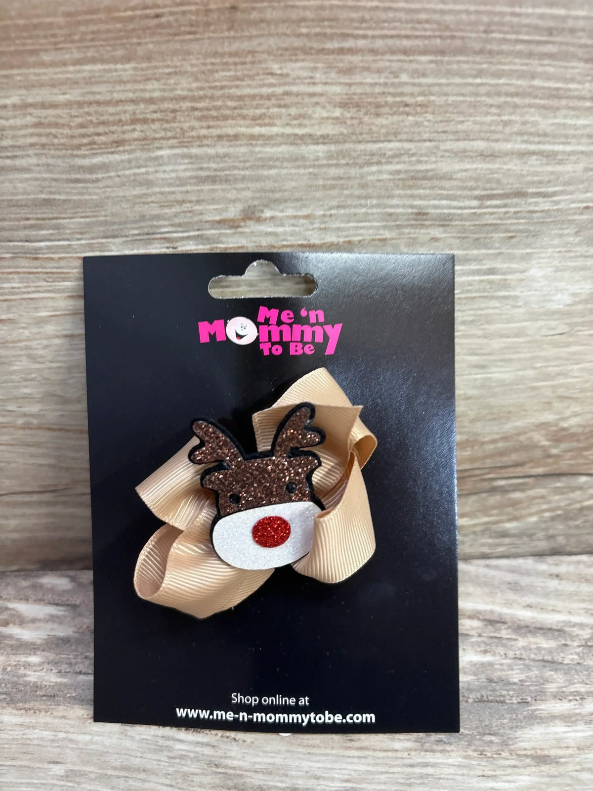 Glitter reindeer hair bow with red nose on gold ribbon, festive kids accessory for holidays