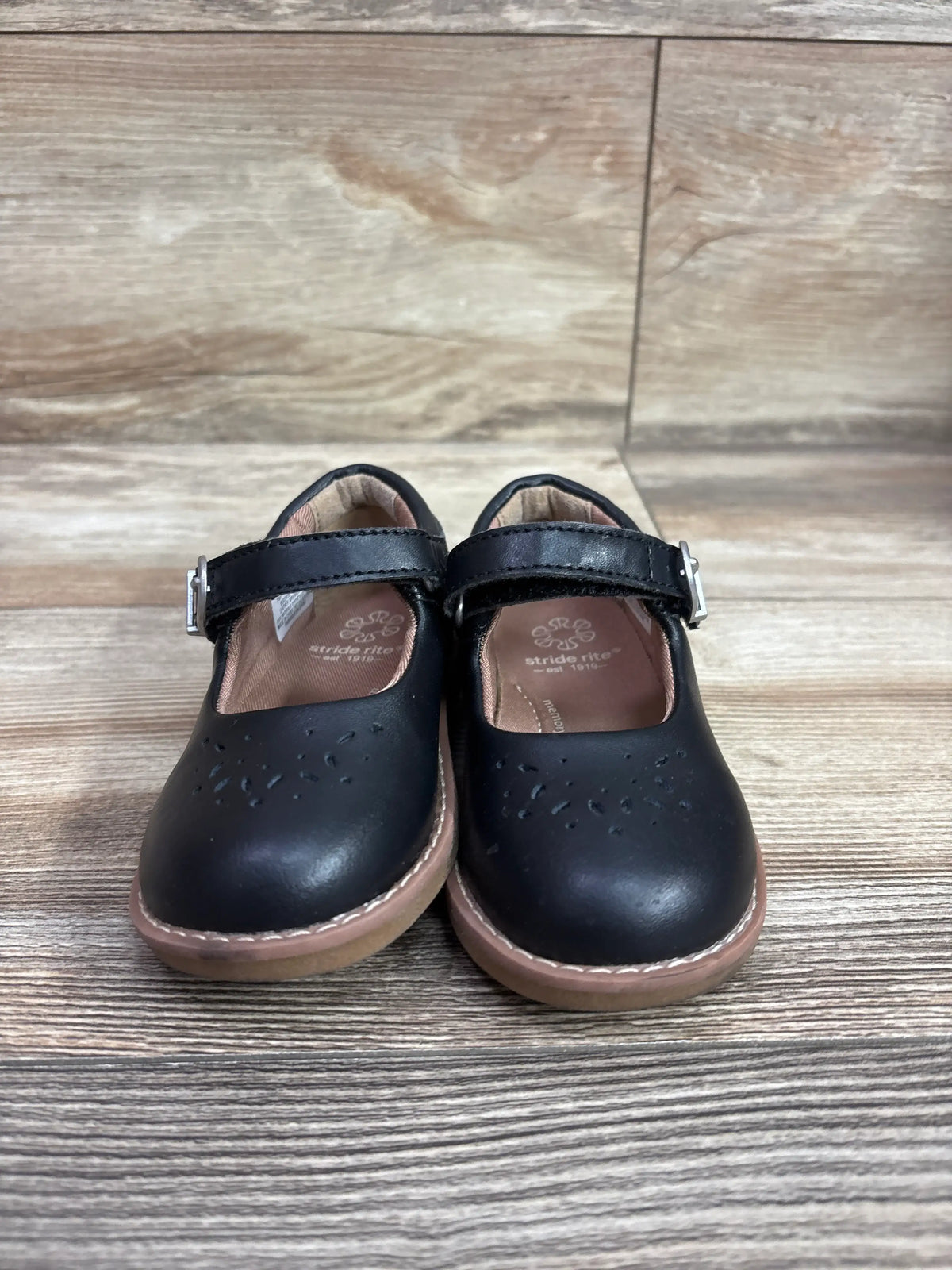 Pair of black Me n Mommy To Be Mary Jane flats for kids with buckle straps