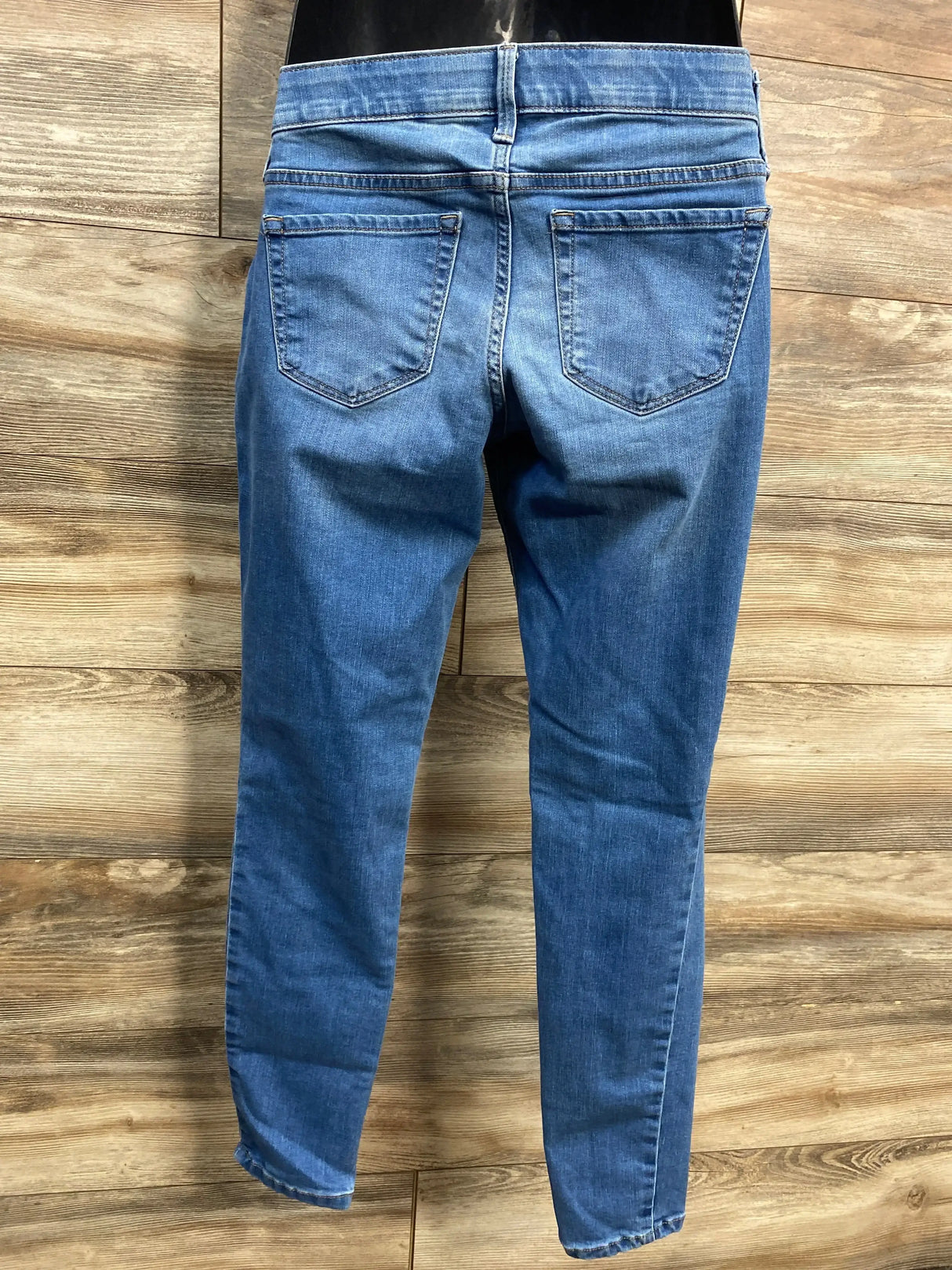 Front view of Isabel maternity side-panel jeggings in blue, size XS, showcasing elastic side panel and slim fit on white background