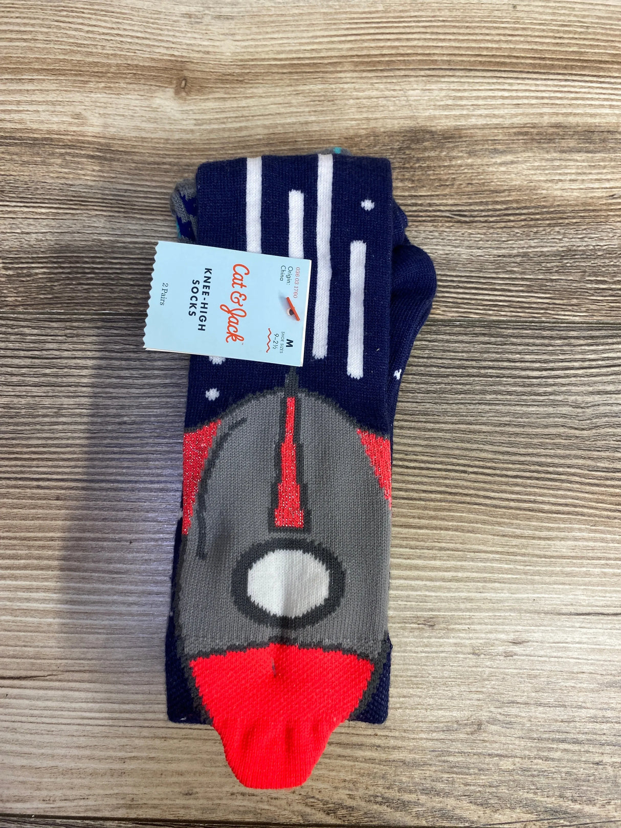 Cat & Jack knee-high socks with spaceship and star pattern, navy blue and red colors