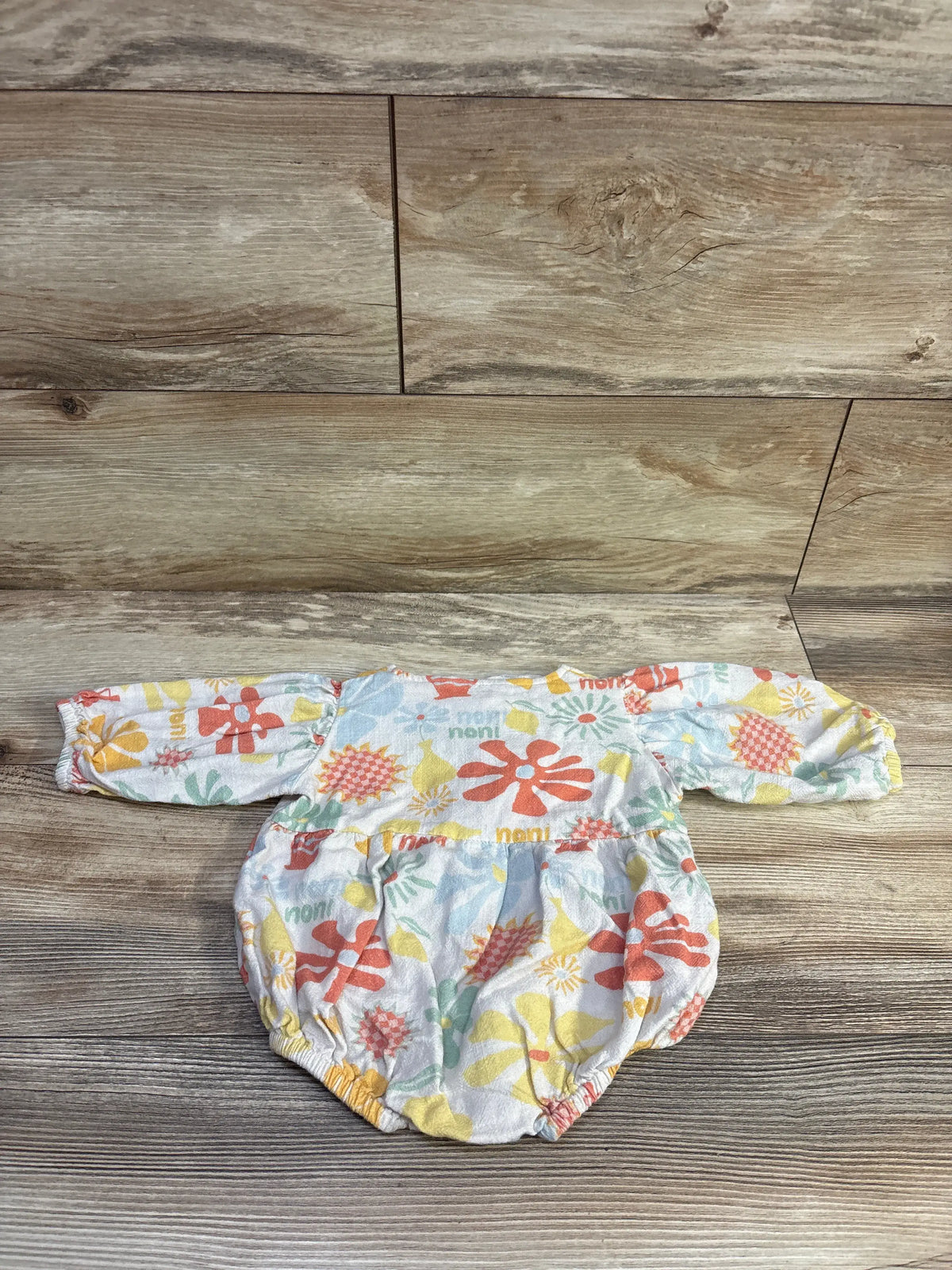 Noni Laguna white front tie romper with colorful floral print for size 6-12 months