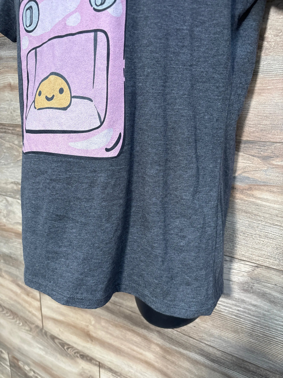 Grey Port & Company maternity shirt featuring a 'Bun in the Oven' graphic illustration