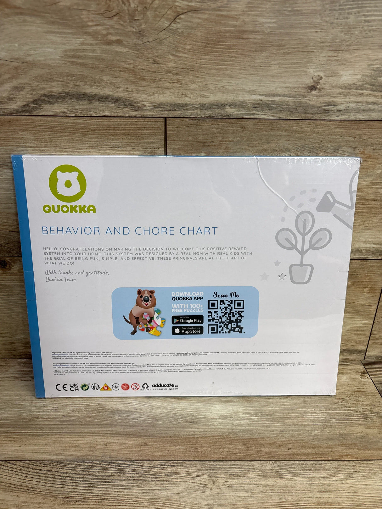 Quokka behavior and chore chart box on wood floor, positive reward system for kids