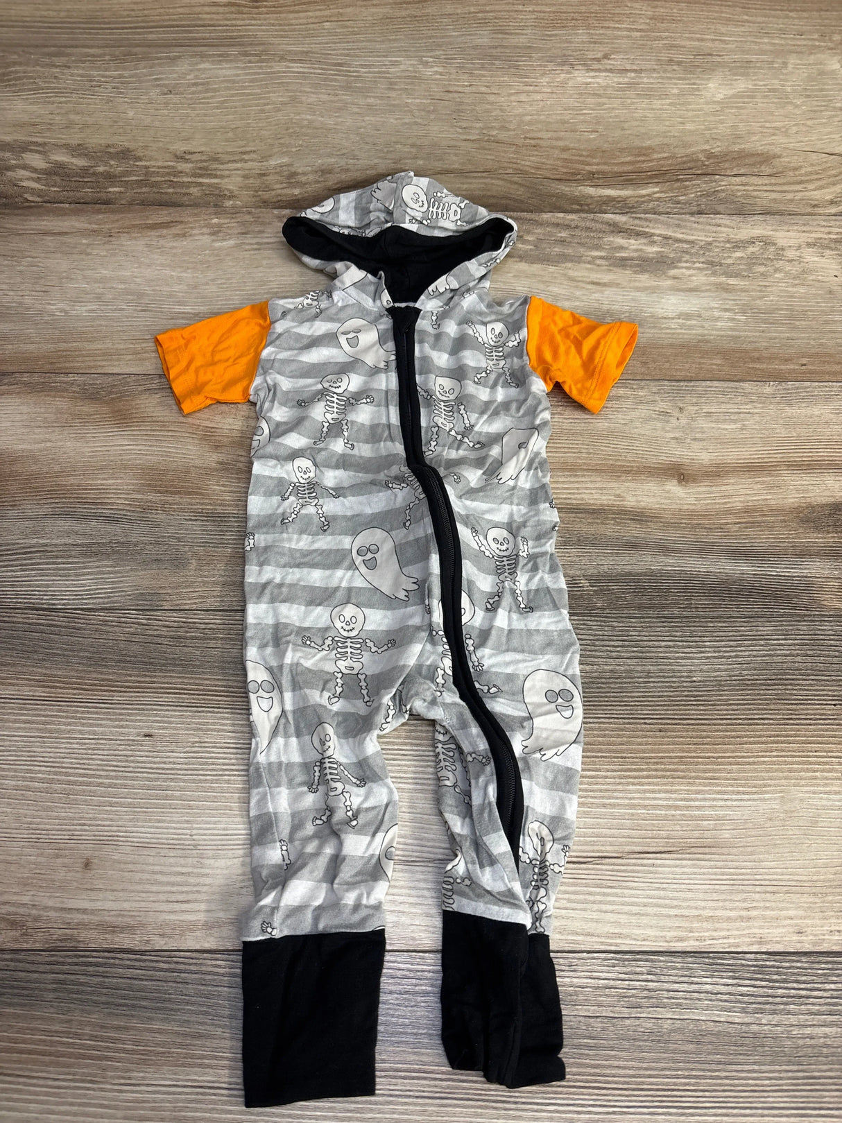 Halloween baby onesie with skeleton and ghost print, orange sleeves, gray stripes, black zipper and cuffs