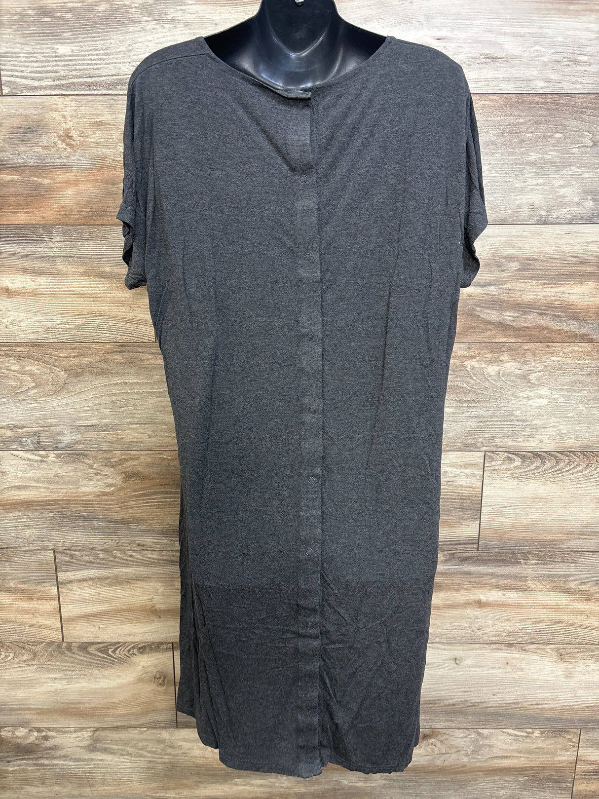 Front view of grey Frida delivery and nursing gown on black mannequin, button-front nursing access, one size, wood backdrop
