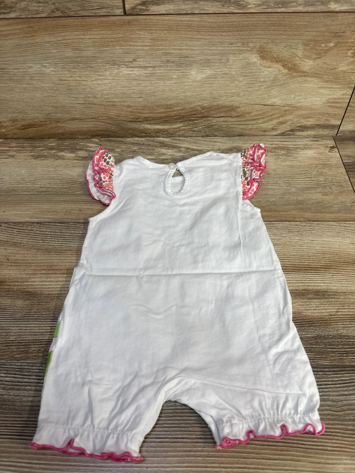 Front view of white Aoswep giraffe and zebra romper, size 0-3m, with pink flutter sleeves and ruffled trim