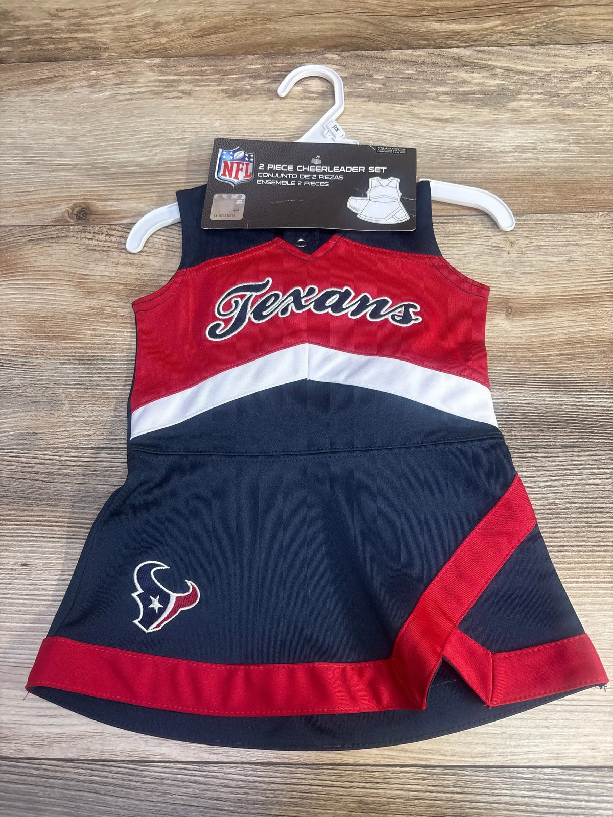 NFL Texans 2-piece cheerleader set with navy blue, red, and white dress on wooden background