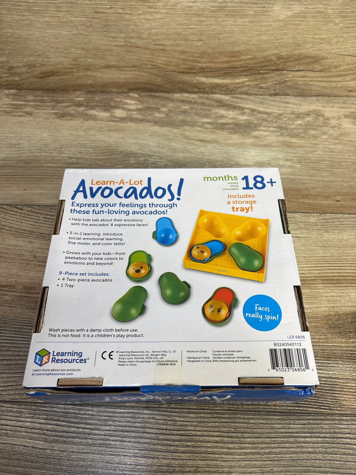 Learn-A-Lot Avocados toy box for toddlers, showing expressive avocado faces and storage tray