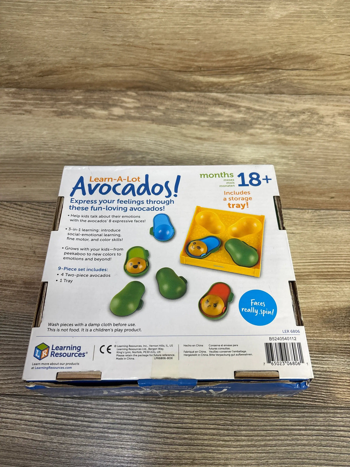 Learn-A-Lot Avocados toy box for toddlers, showing expressive avocado faces and storage tray