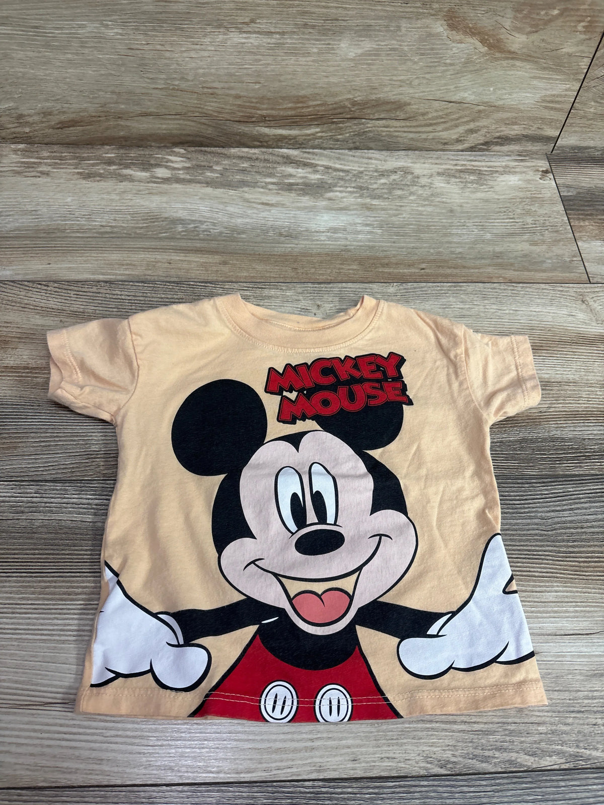 Orange Disney Junior Mickey Mouse t-shirt for toddlers, size 18m.