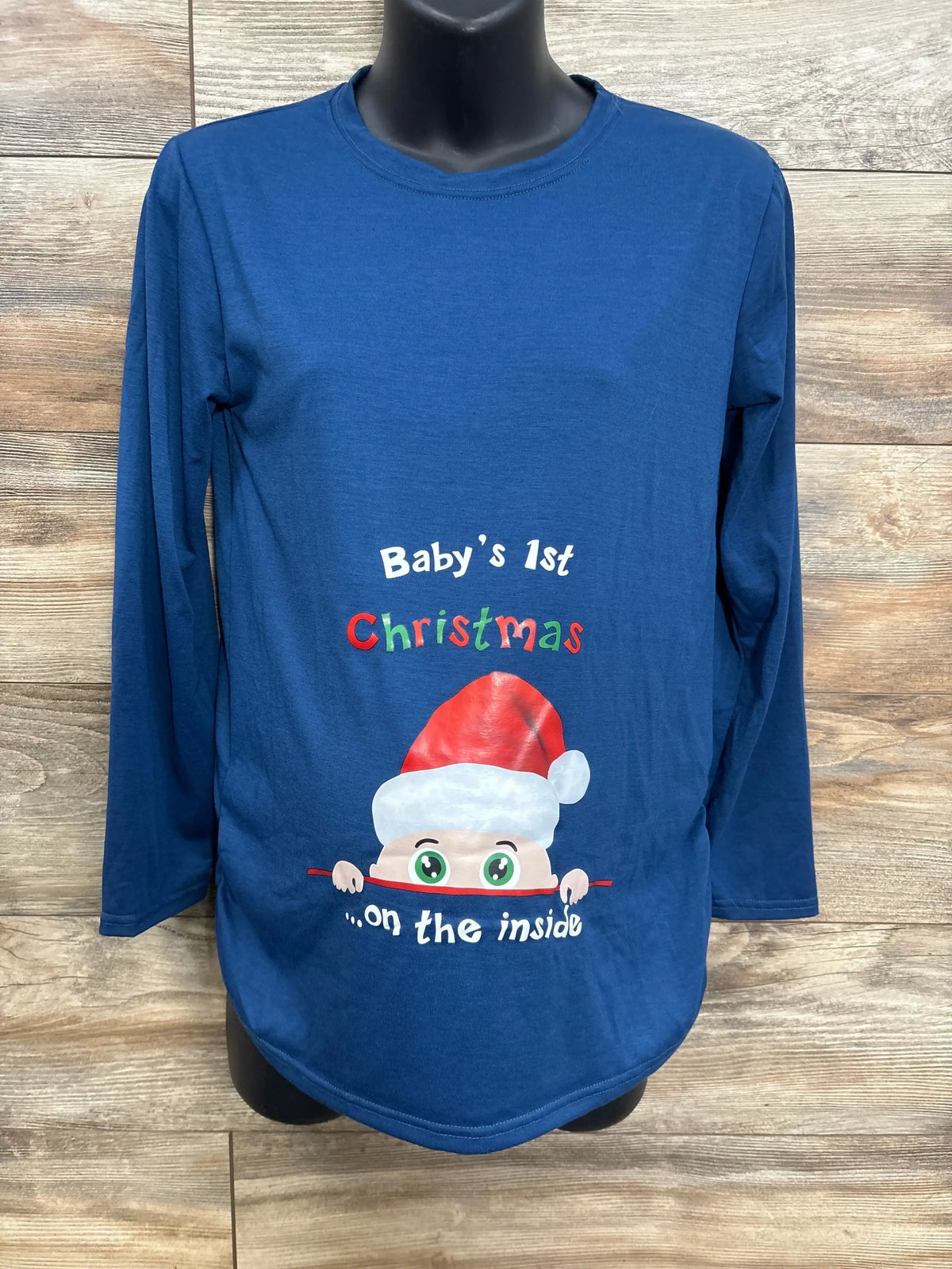 Blue maternity shirt with 'Baby's 1st Christmas' and cartoon baby in Santa hat design.
