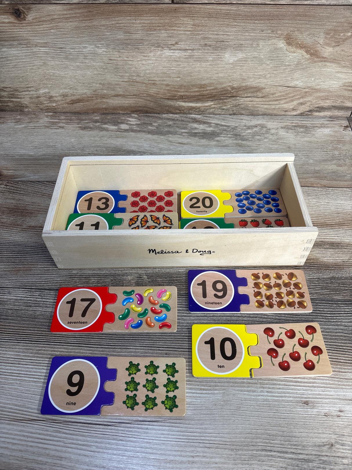Melissa & Doug Self-Correcting Wooden Number Puzzles With Storage Box