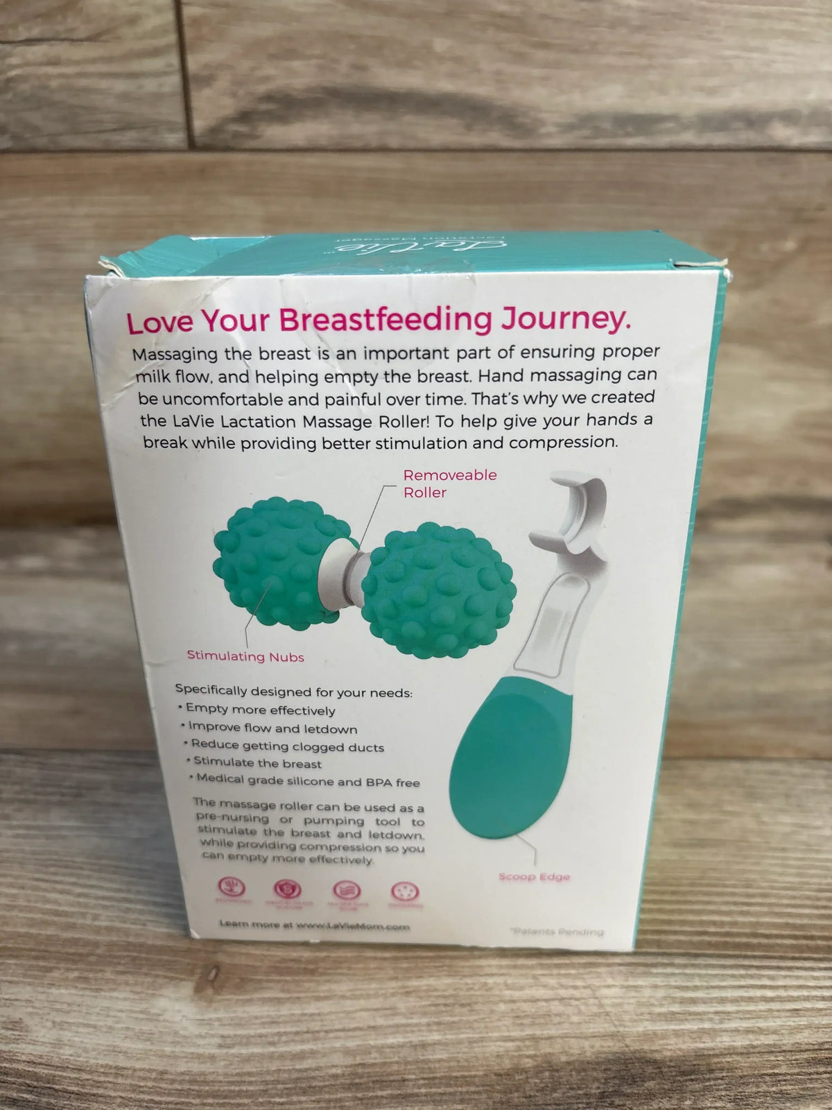 LaVie massage roller box (teal) showing headline ‘Love Your Breastfeeding Journey’ and textured double roller illustration
