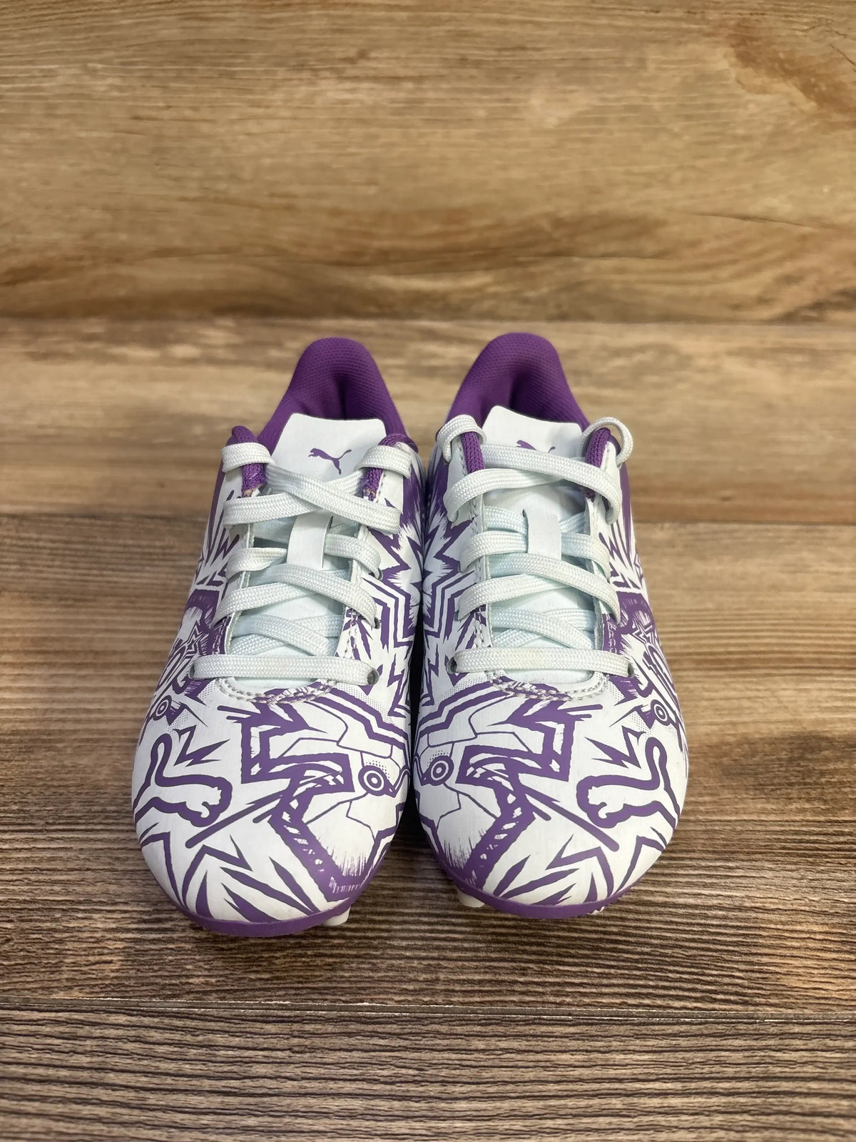 Front view of Puma Tacto II soccer cleats in Dewdrop-Ultraviolet with purple graphics and white laces