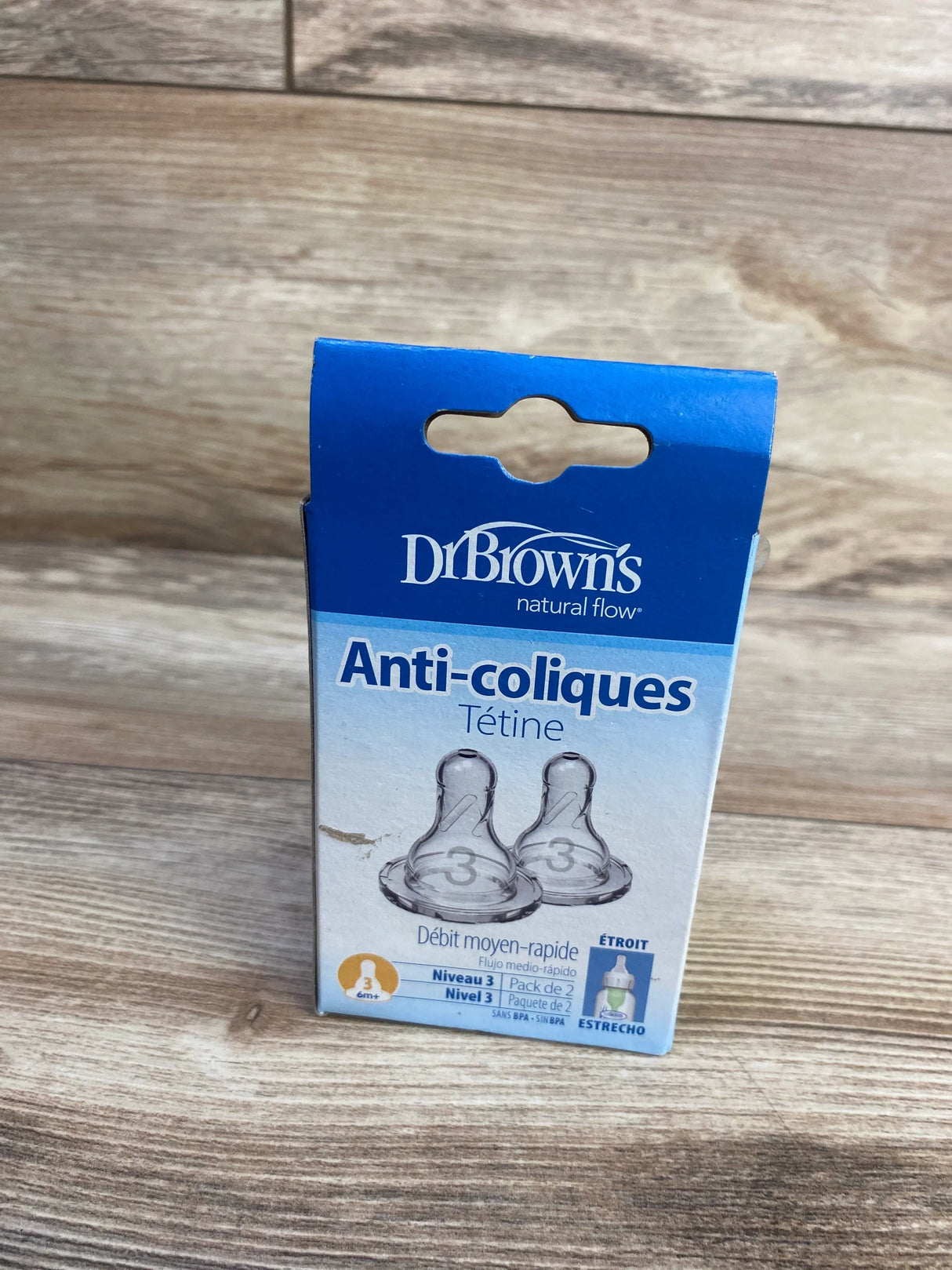 Front view of Dr. Brown's Anti-Colic Level 3 narrow medium-fast nipples 2-pack box showing logo and 'Anti-coliques' text on a wooden surface