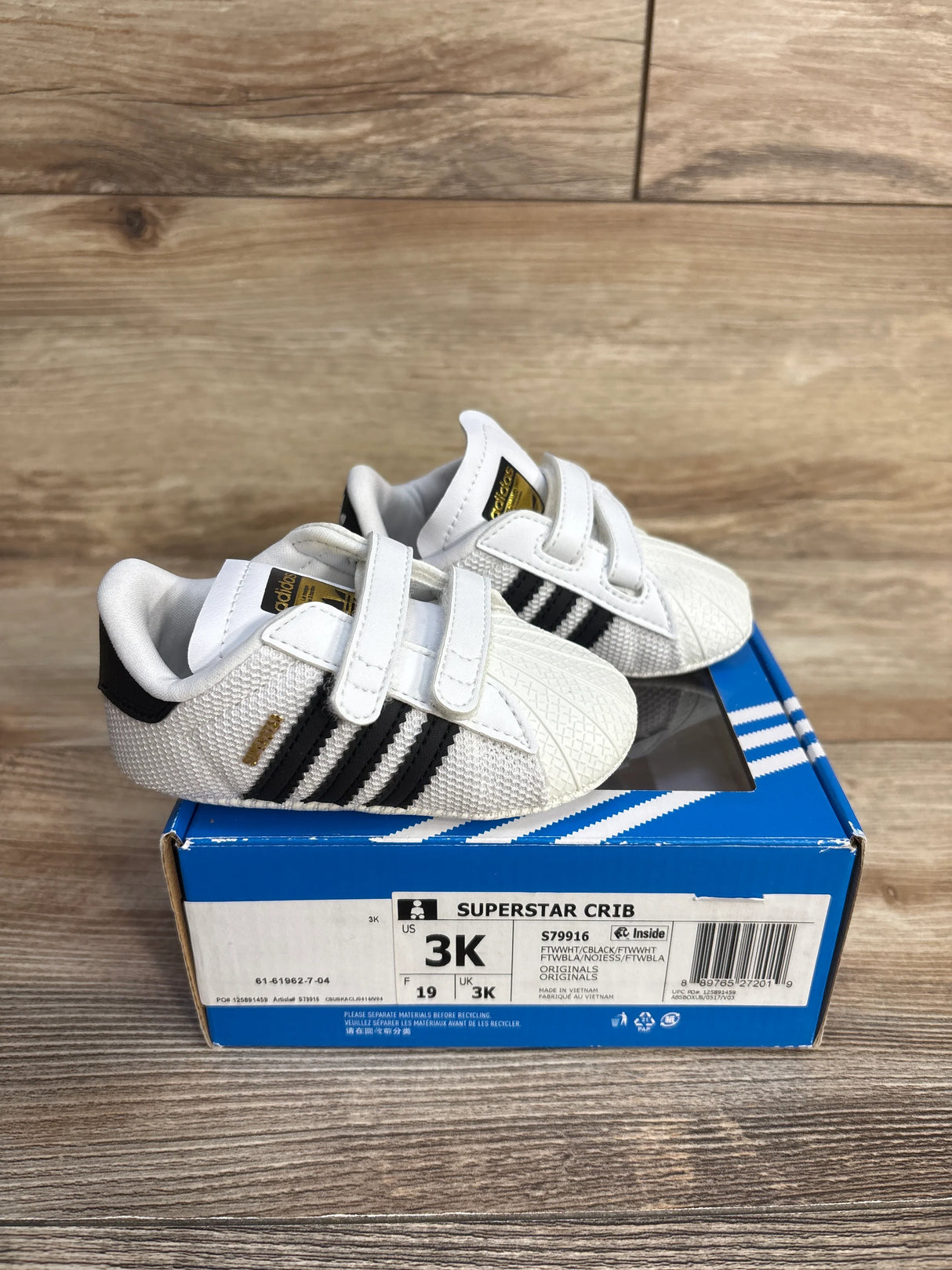 Adidas Superstar Crib baby shoes white with black stripes on blue box, size 3K