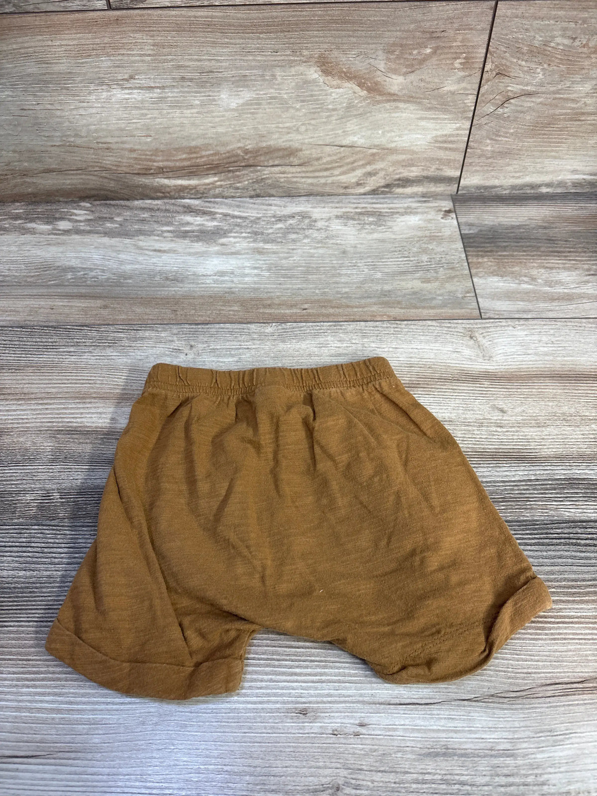 Front view of Old Navy caramel pull-on shorts, size 18-24 months, showcasing elastic waistband and rolled hems