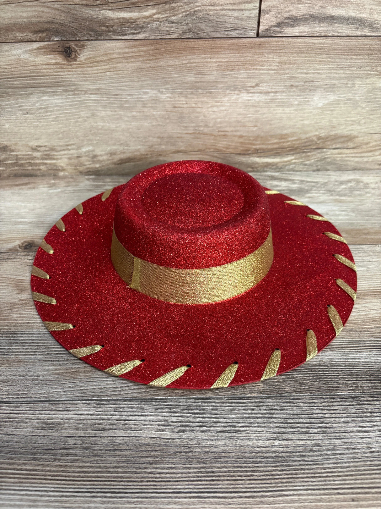 Red glitter cowboy hat with gold trim for kids costume or party wear