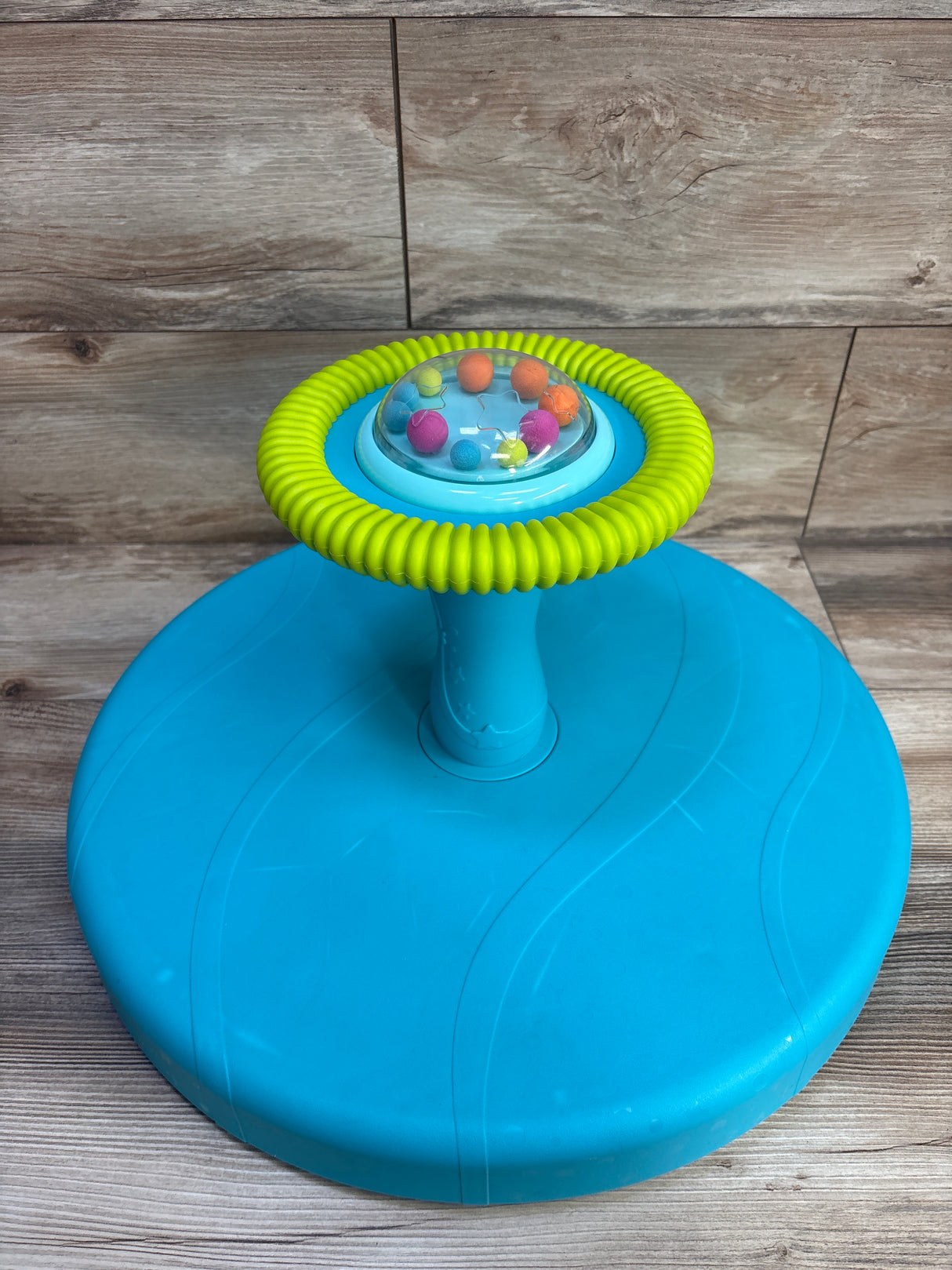 B. Toys Twirly Time Spinning Activity Toy