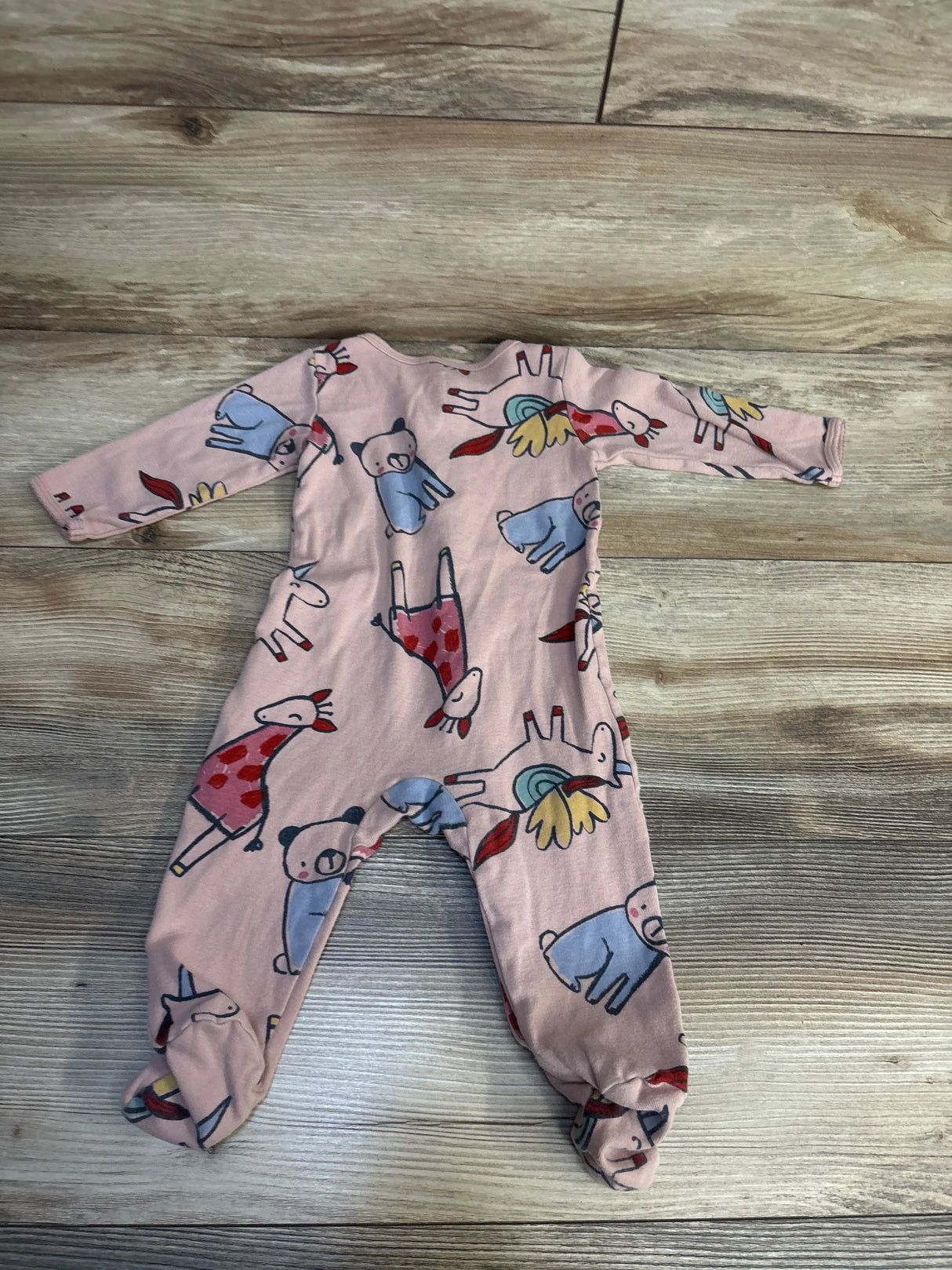 Pink baby onesie with cute animal print, perfect for infant clothing and baby gear