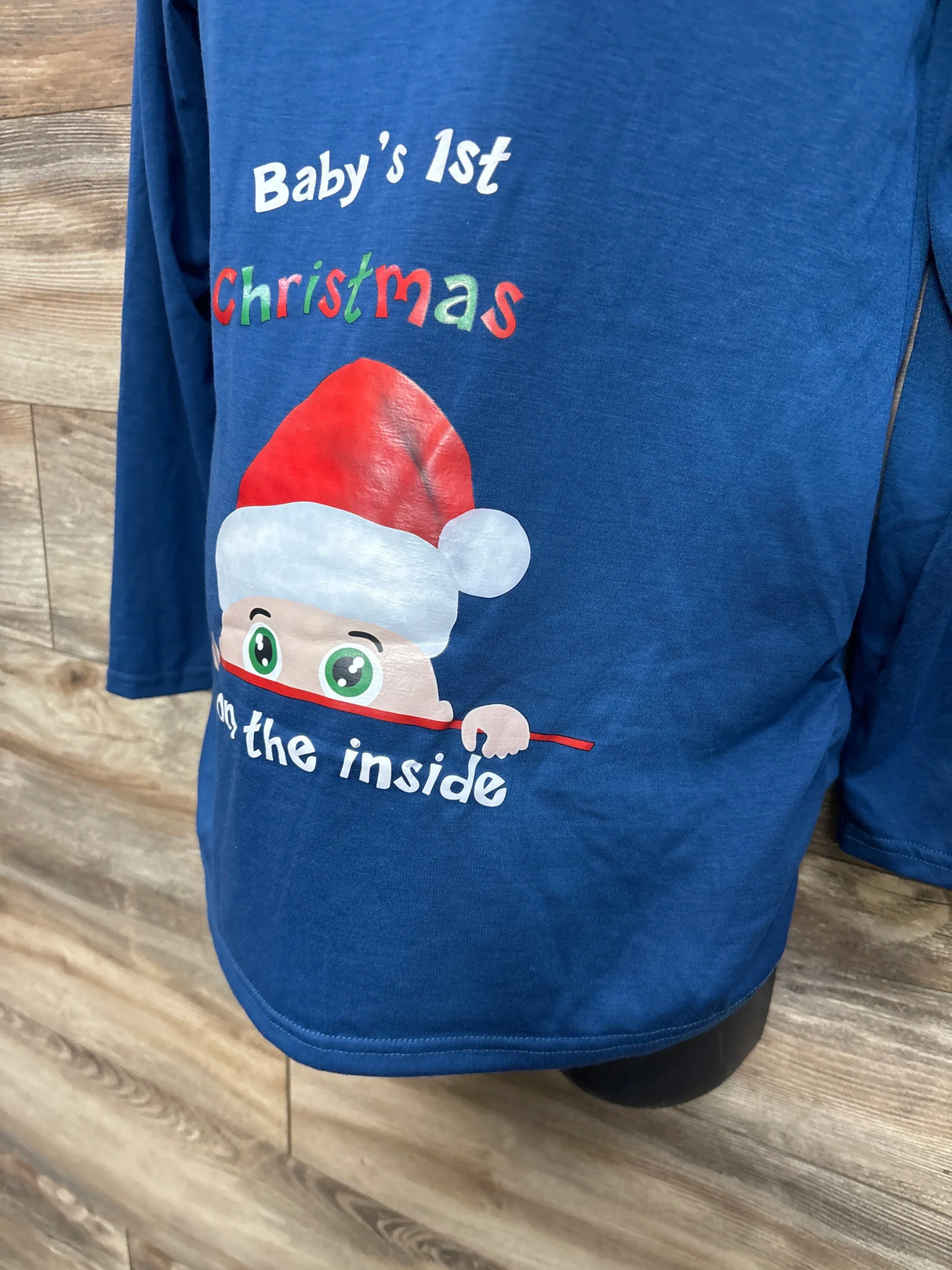 Blue maternity shirt with 'Baby's 1st Christmas' and cartoon baby in Santa hat design