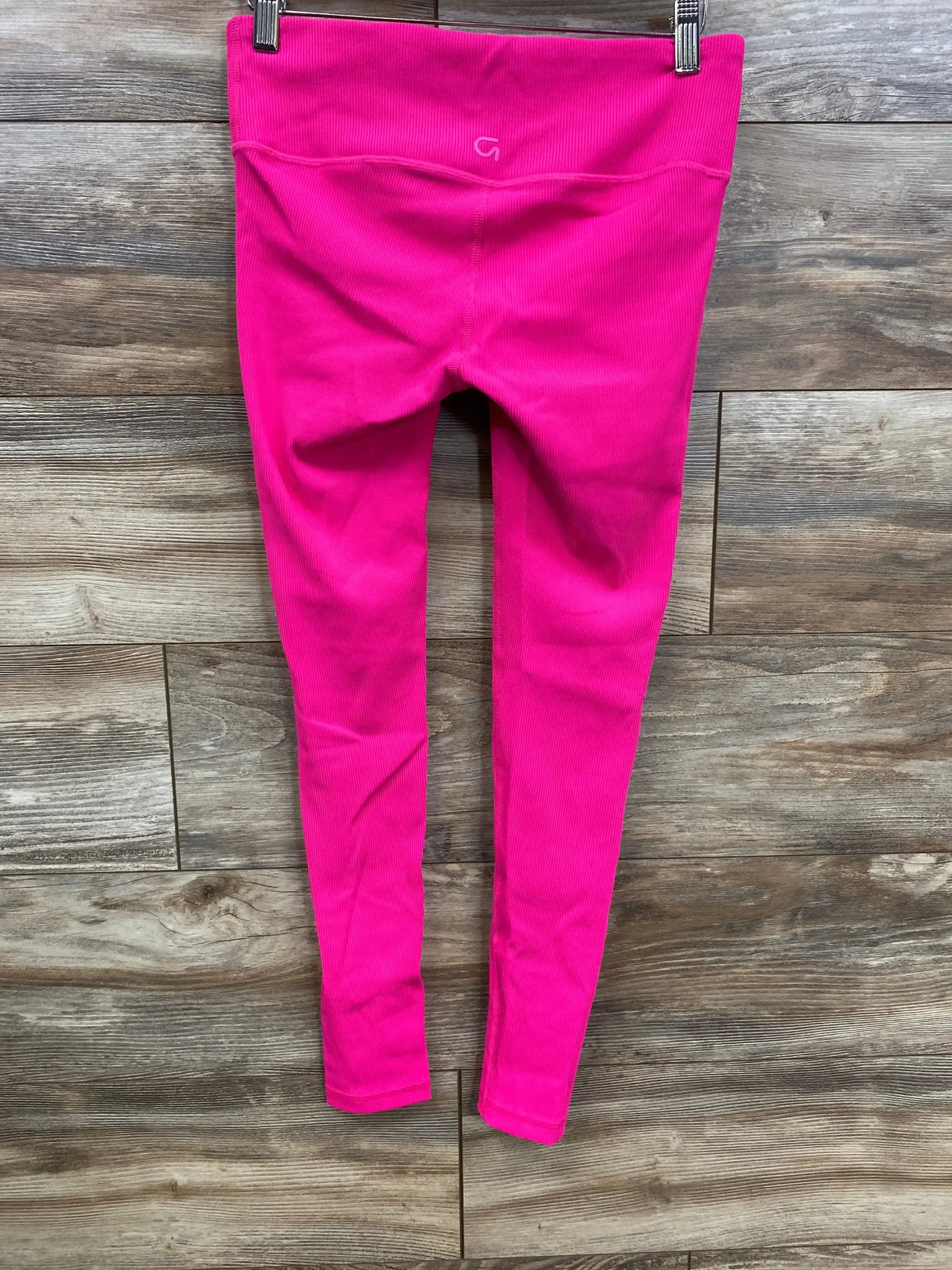 Front view of pink Gap Fit maternity leggings, under-belly ribbed waistband and blackout fabric on white background, size XS