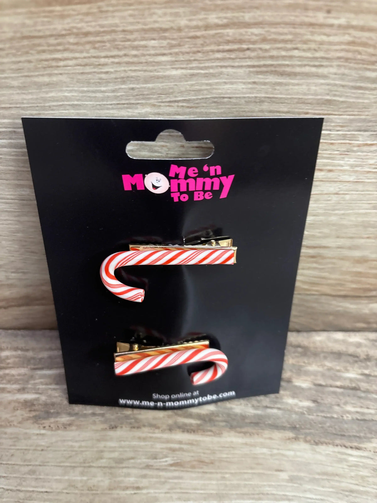 Candy cane hair clips with red and white stripes, festive holiday accessory for kids or moms-to-be