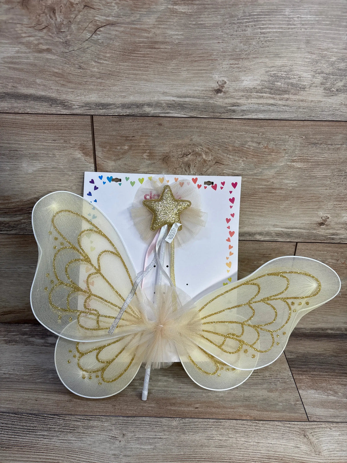 Front view of Claire’s Club 2pc Butterfly Wings and Wand with translucent wings, gold glitter details, and star topped wand