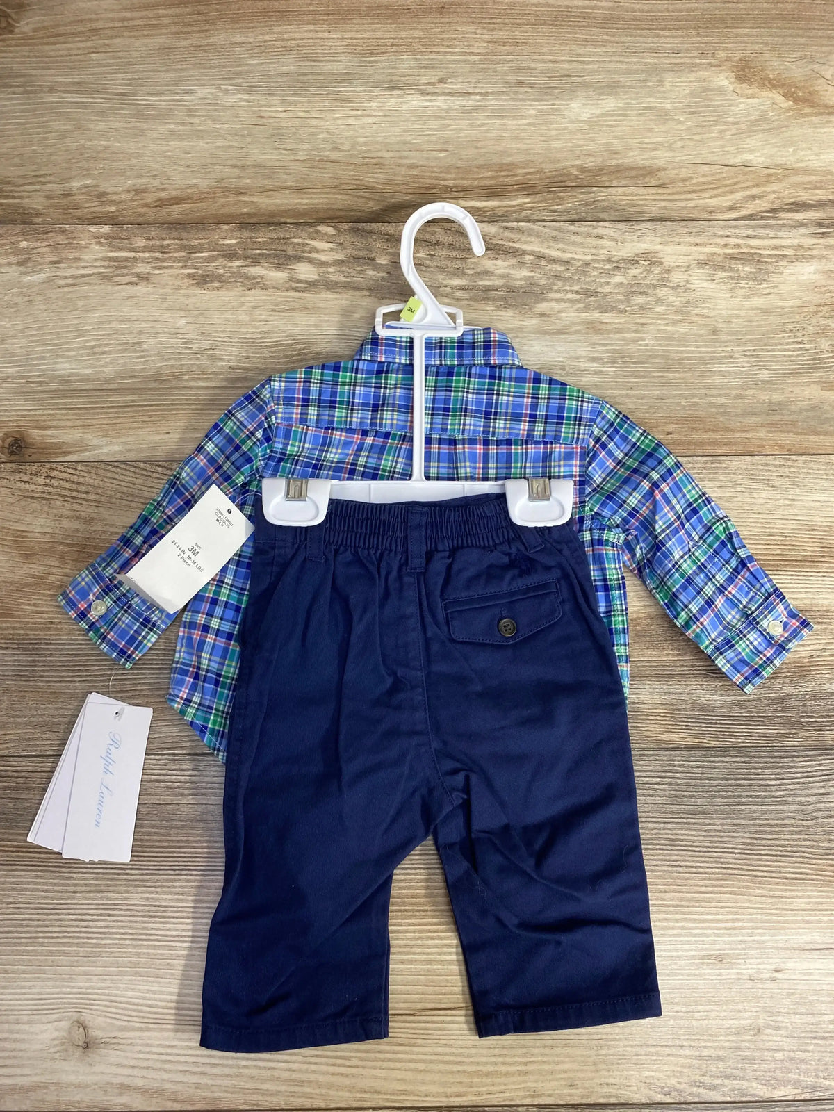 Infant boy's 3-month outfit with blue and green plaid shirt and navy pants on hanger