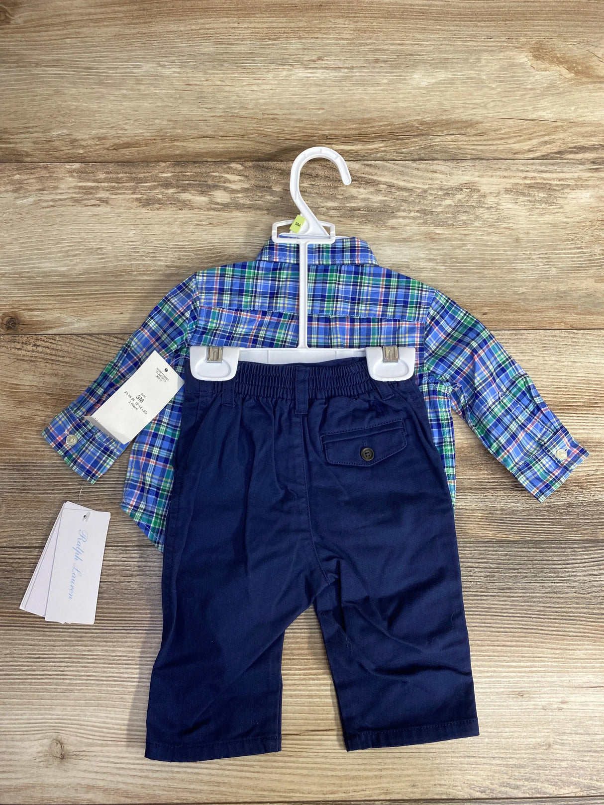 Infant boy's 3-month outfit with blue and green plaid shirt and navy pants on hanger