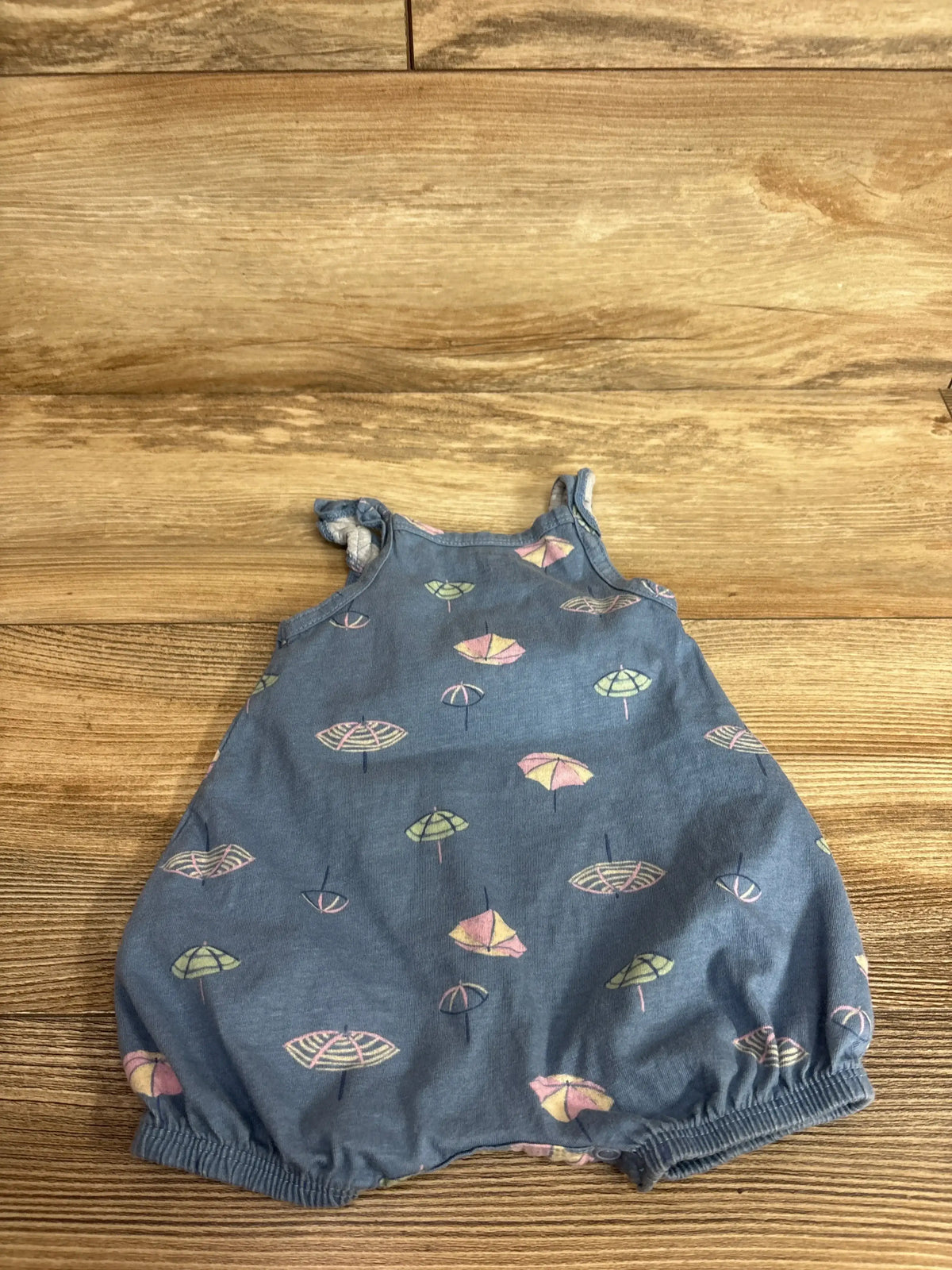 Front view of Carter’s blue umbrella tank shortie romper, size 3 months, with umbrella print and elastic leg openings