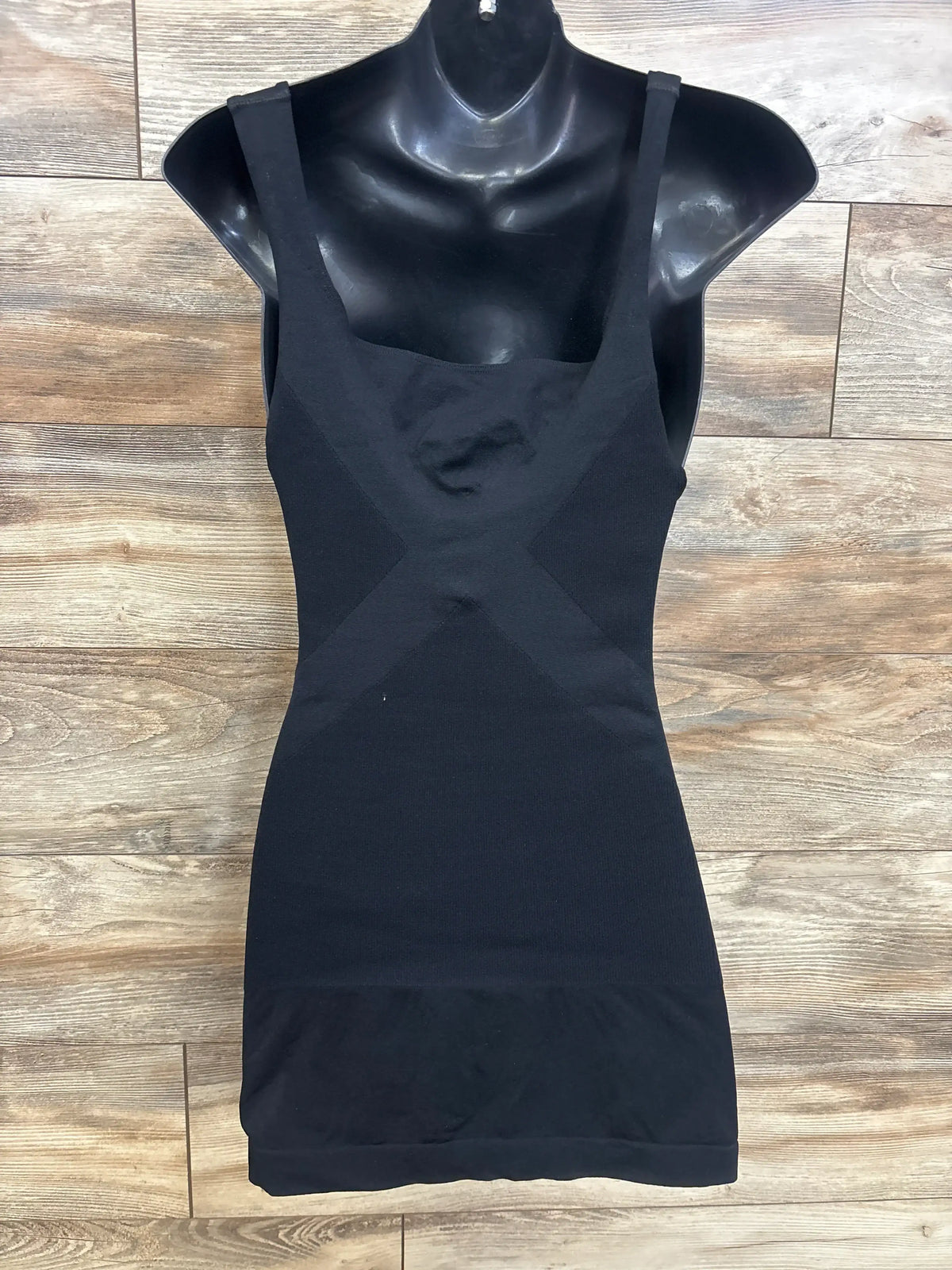 Front view of black Blanqi maternity belly support tank top showcasing scoop neck, wide straps, and long length on a mannequin
