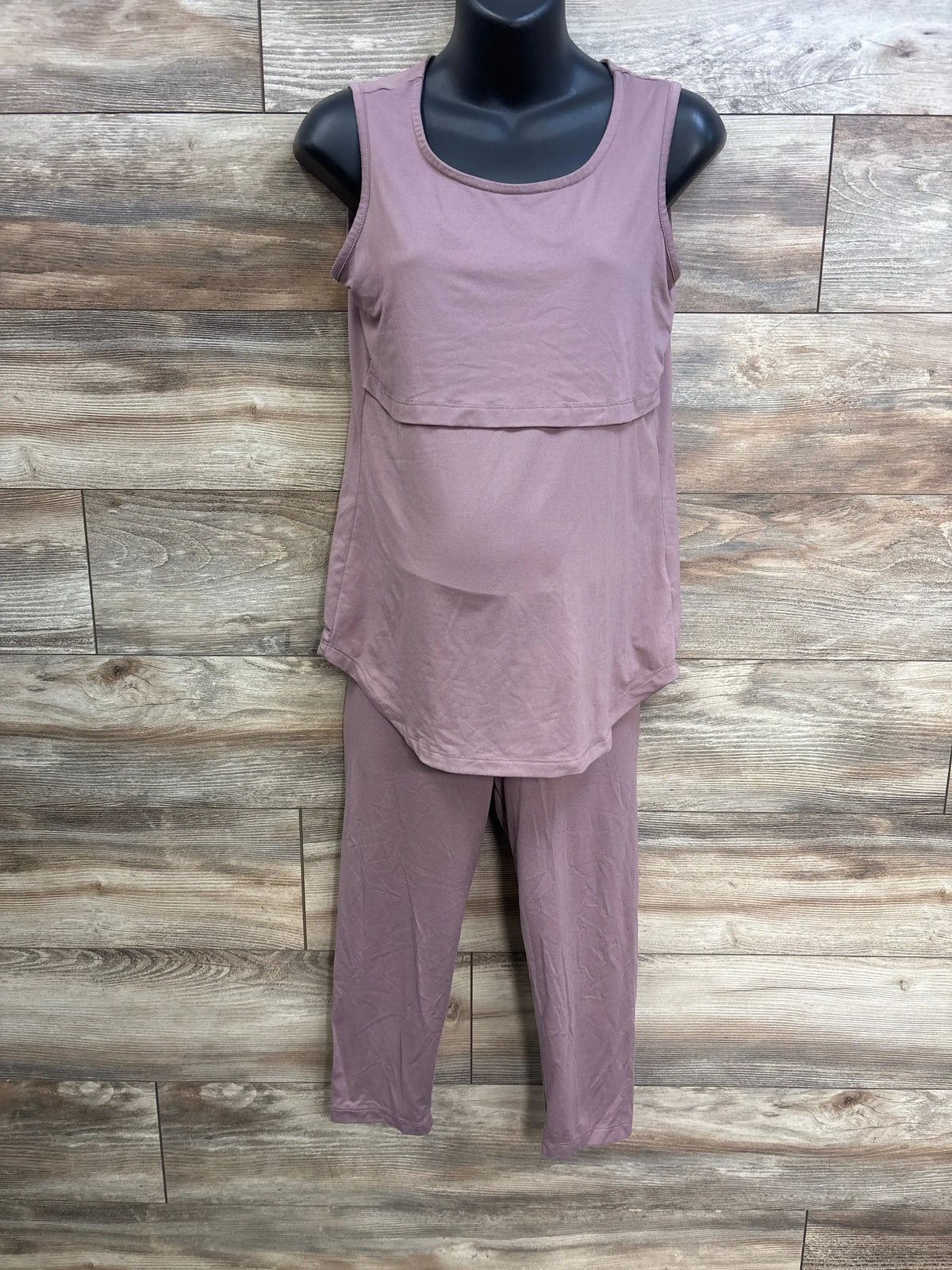 Front view of pink nursing tank top and shorts set showing sleeveless tank and layered nursing panel on a mannequin
