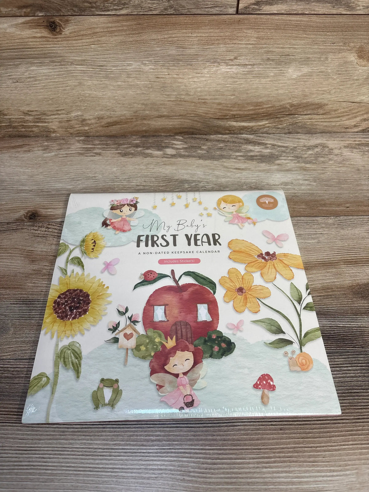 My Baby's First Year keepsake calendar with fairies, flowers, and whimsical illustrations