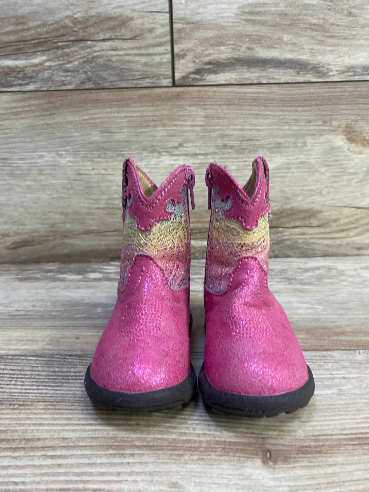 Front view of Roper Infant Glitter Cowbabies boots showcasing purple glitter vamp, brown shaft, and round toes