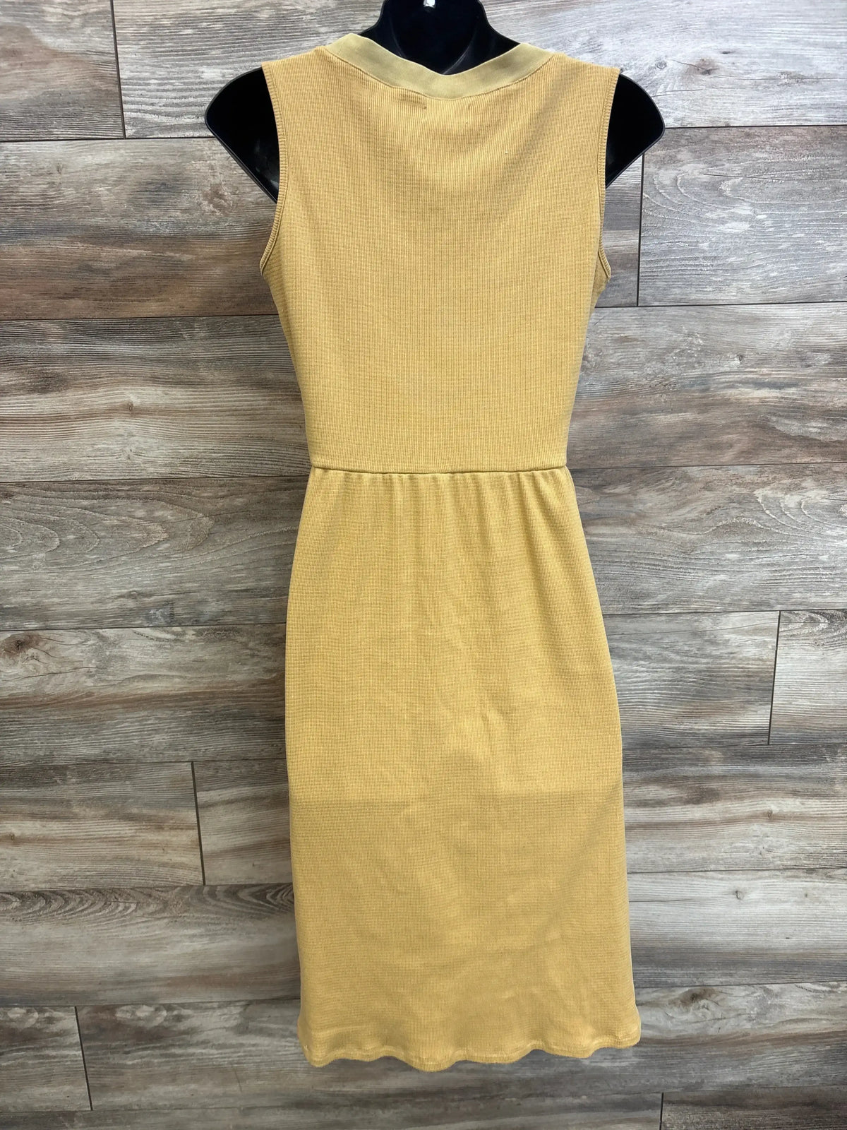 Front view of Roolee Mom nursing tank dress showing mustard yellow ribbed fabric, fitted waist and midi length on a mannequin