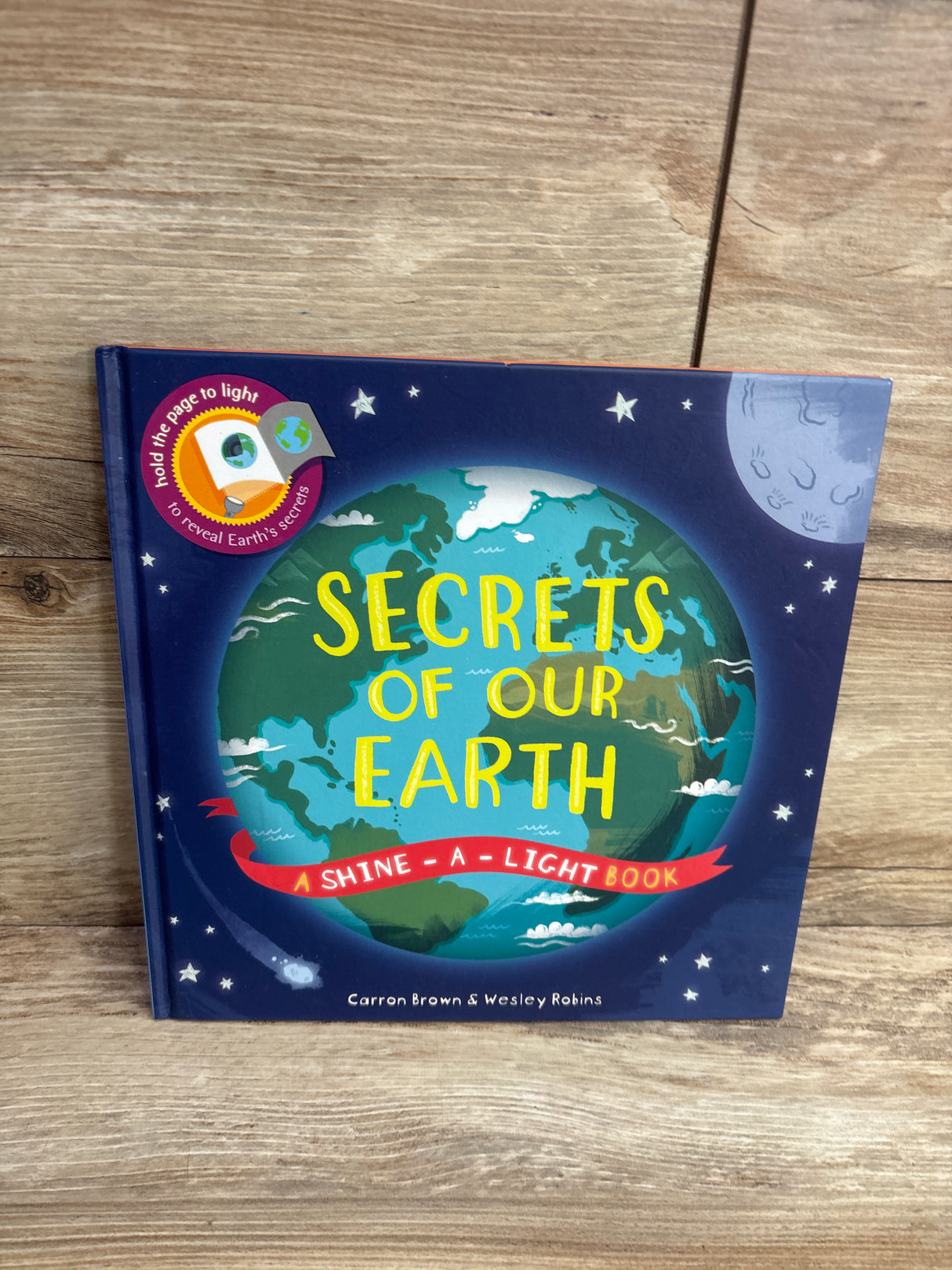 Secrets of Our Earth (Shine-A-Light) Hardcover Book