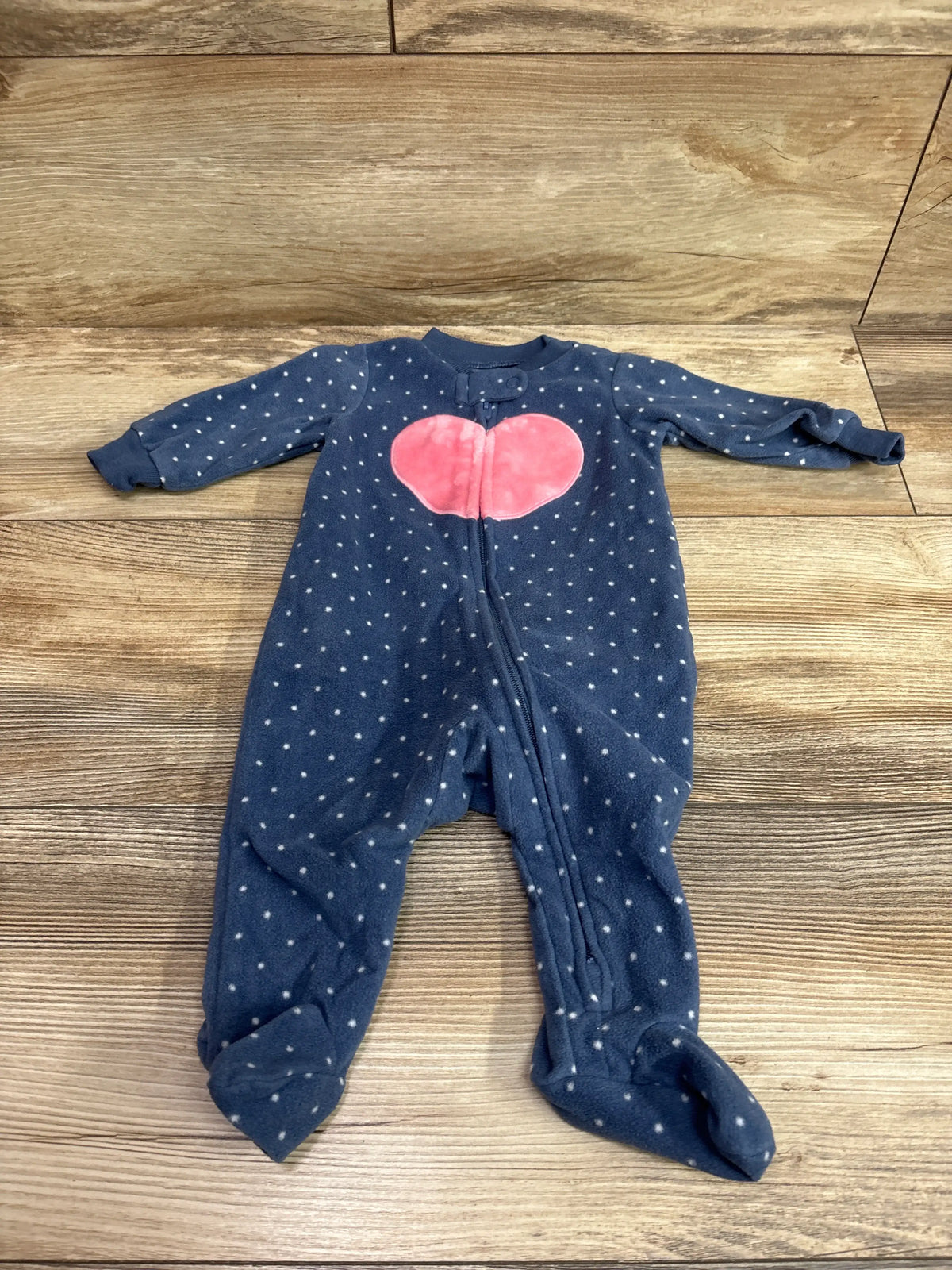 Navy blue Carter's baby blanket sleeper with white polka dots and a pink heart