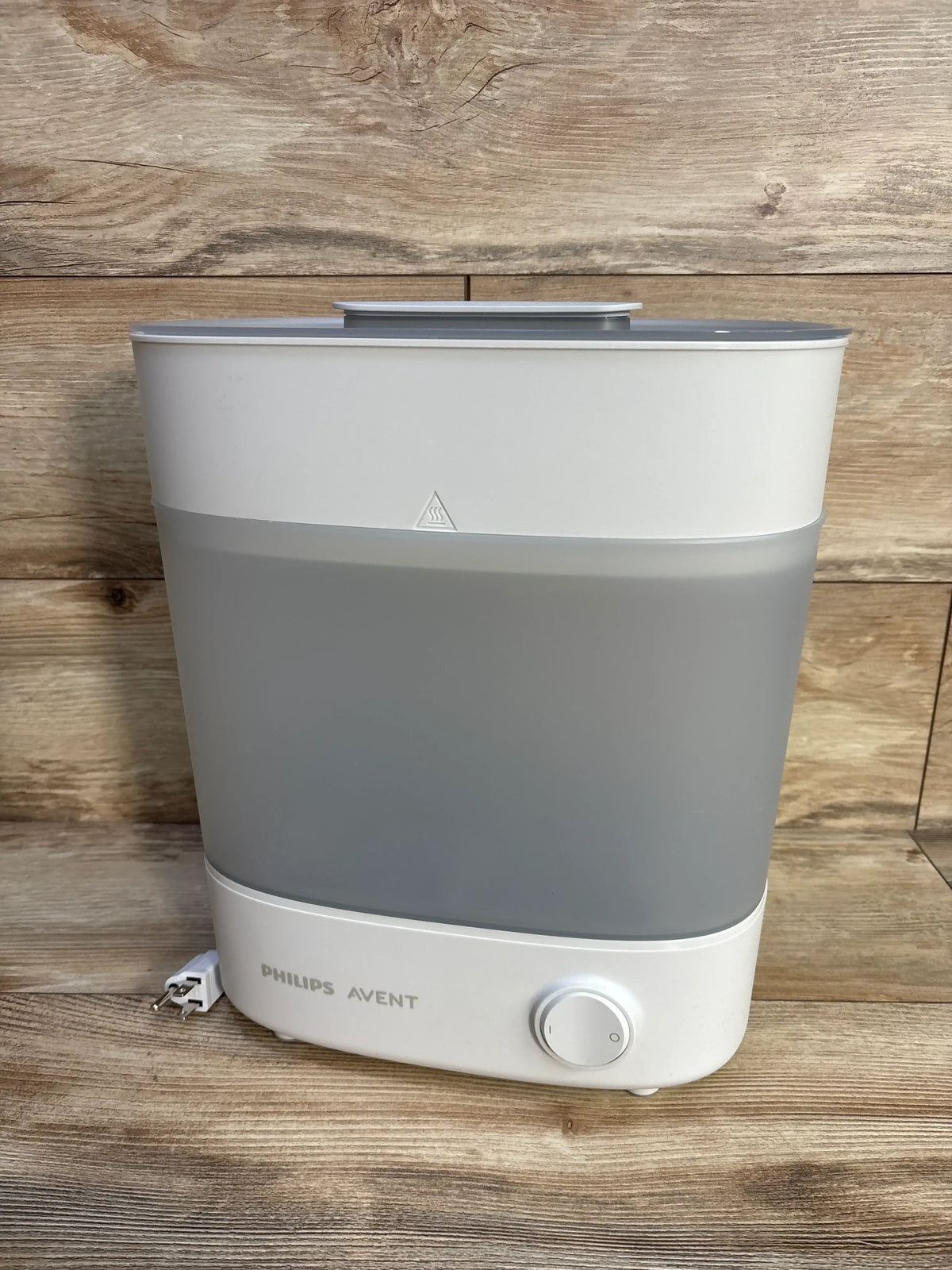 Front view of Philips Avent Advanced Electric Steam Sterilizer showcasing white and gray housing, lid, and control dial