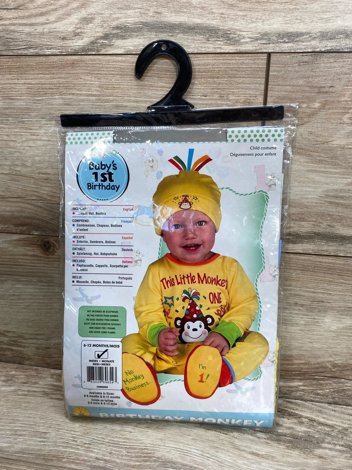Front view of Rubie’s 1st birthday monkey costume in yellow with hat and booties, packaged for ages 6 to 12 months