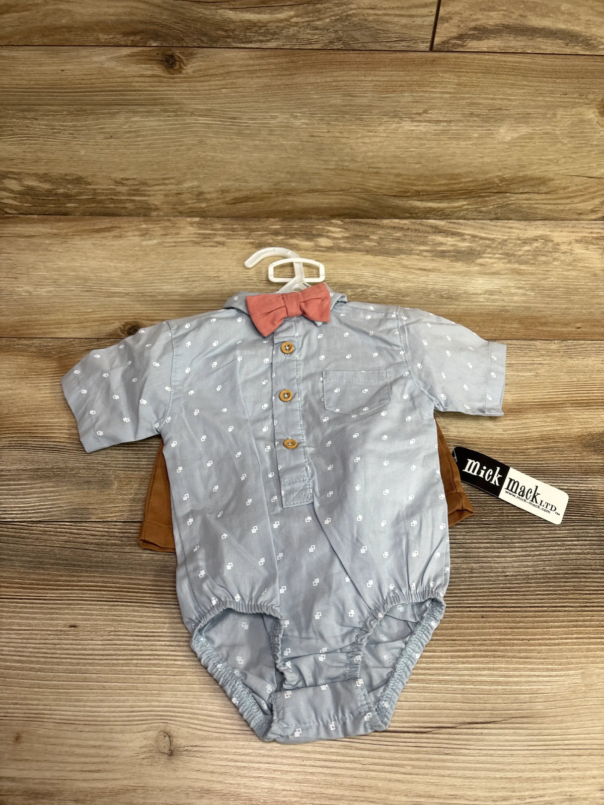 New Me n Mommy To Be 2pc polo bodysuit and shorts set in blue with a pink bow tie