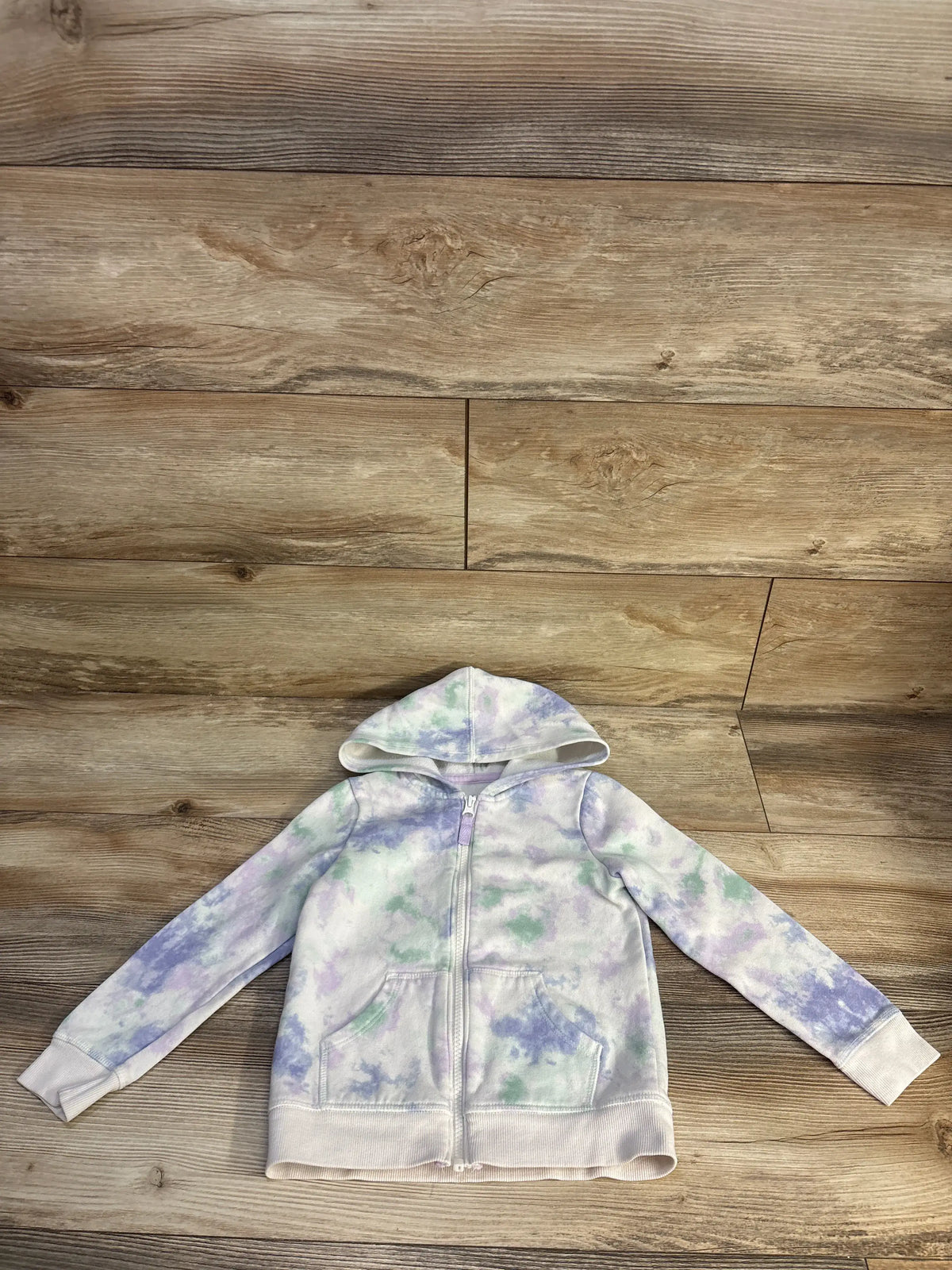 Front view of Cat & Jack full zip jacket in white showcasing hood, full zip closure, and front pockets on a wood floor