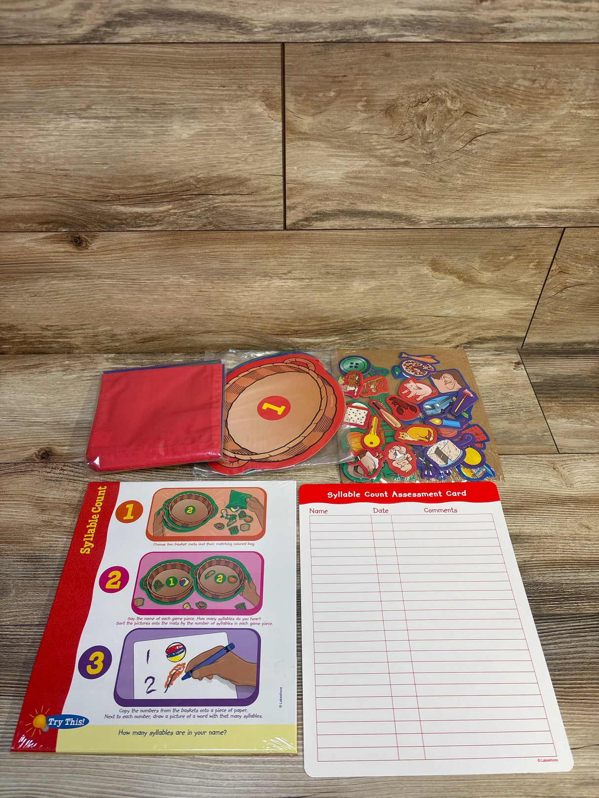 Kids syllable count learning kit with activity cards, assessment sheet, and game pieces