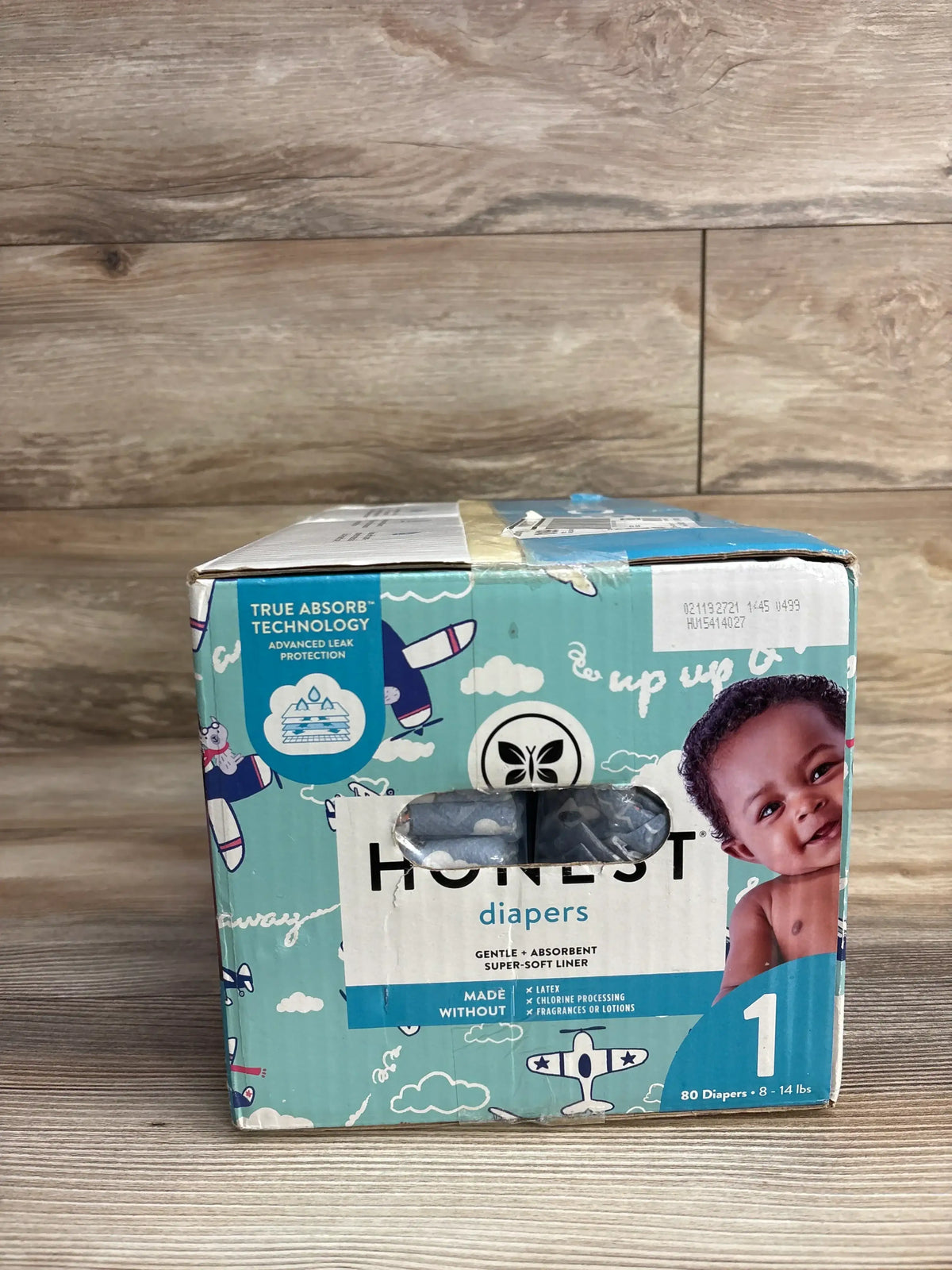 Box of Honest brand size 1 diapers with gentle, absorbent liner and True Absorb technology, 80 diapers for 8-14 lbs