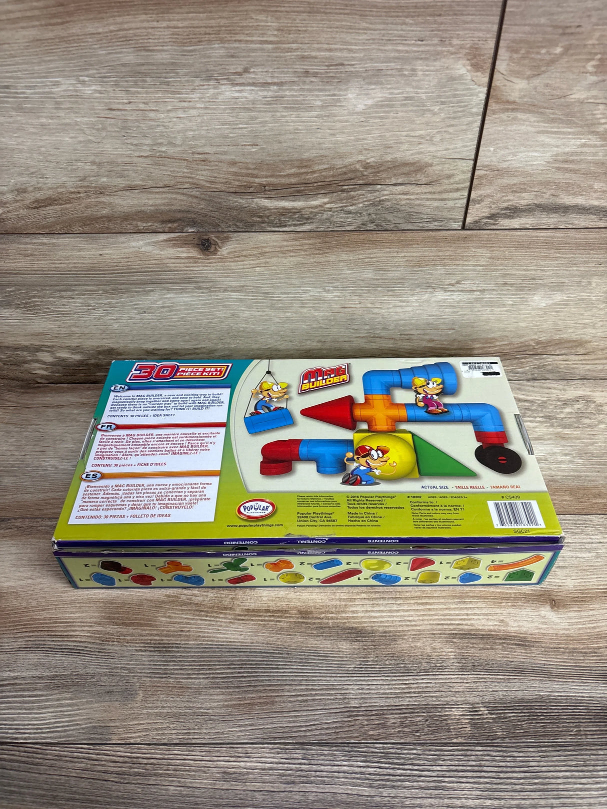 Mag Builder 30-piece magnetic building toy set box on wood surface, colorful pieces visible