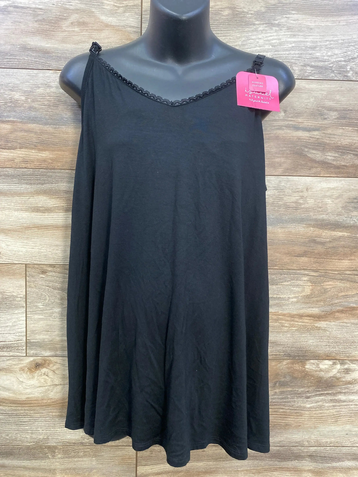 Black maternity nursing tank top with lace trim on mannequin against wood background