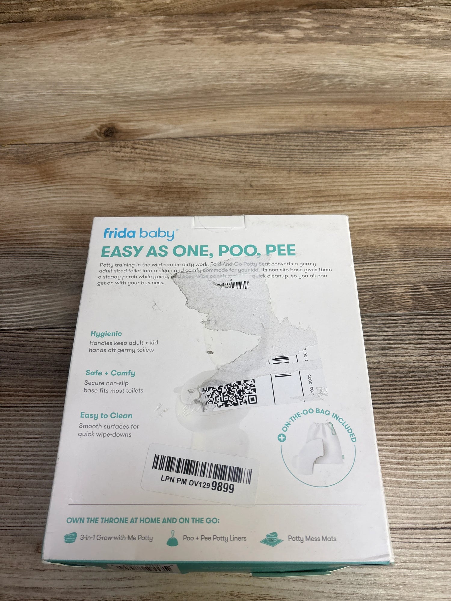 Frida Baby Fold-And-Go Potty Seat - White